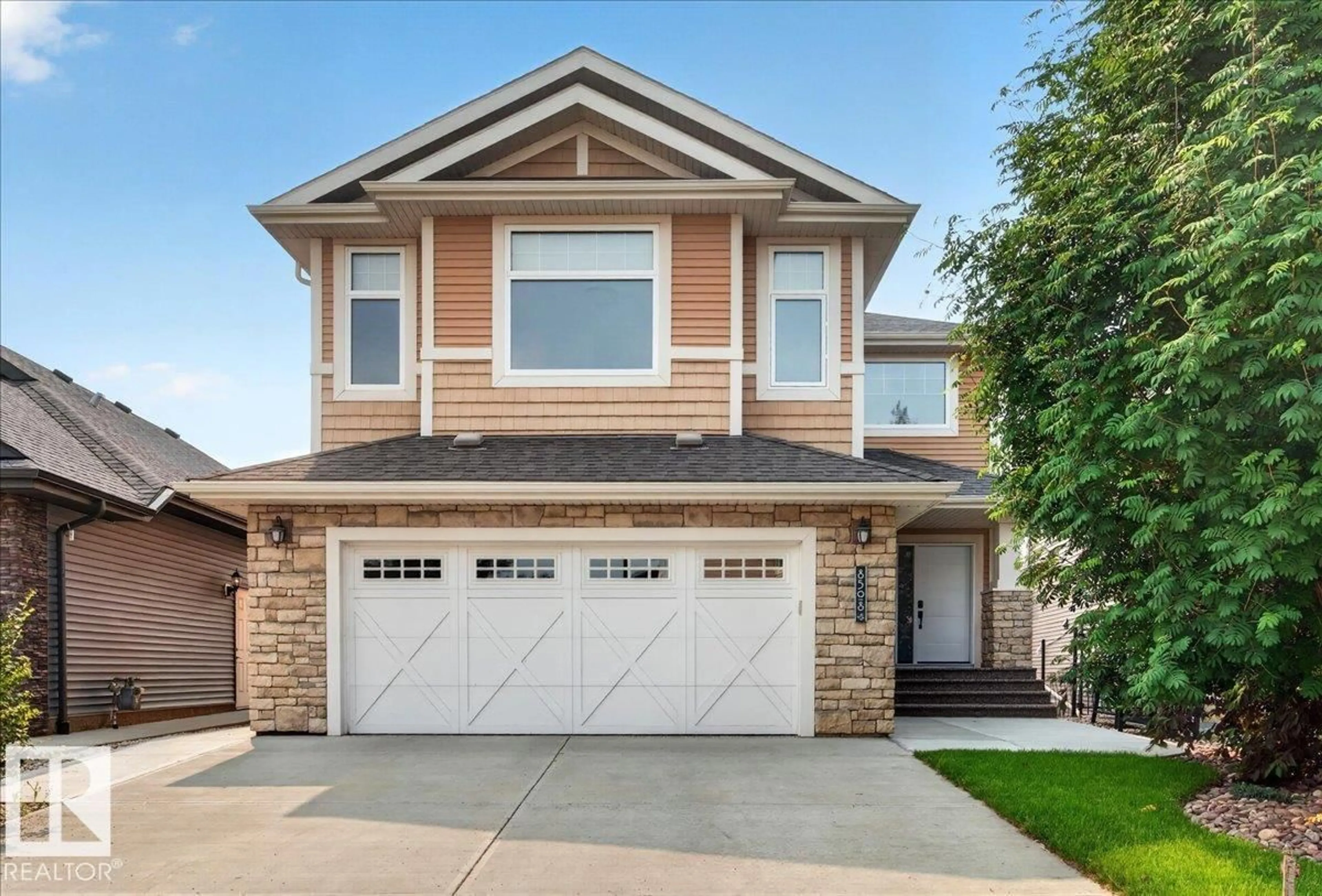 Home with vinyl exterior material, street for NW - 8508 218 ST, Edmonton Alberta T5T4R9