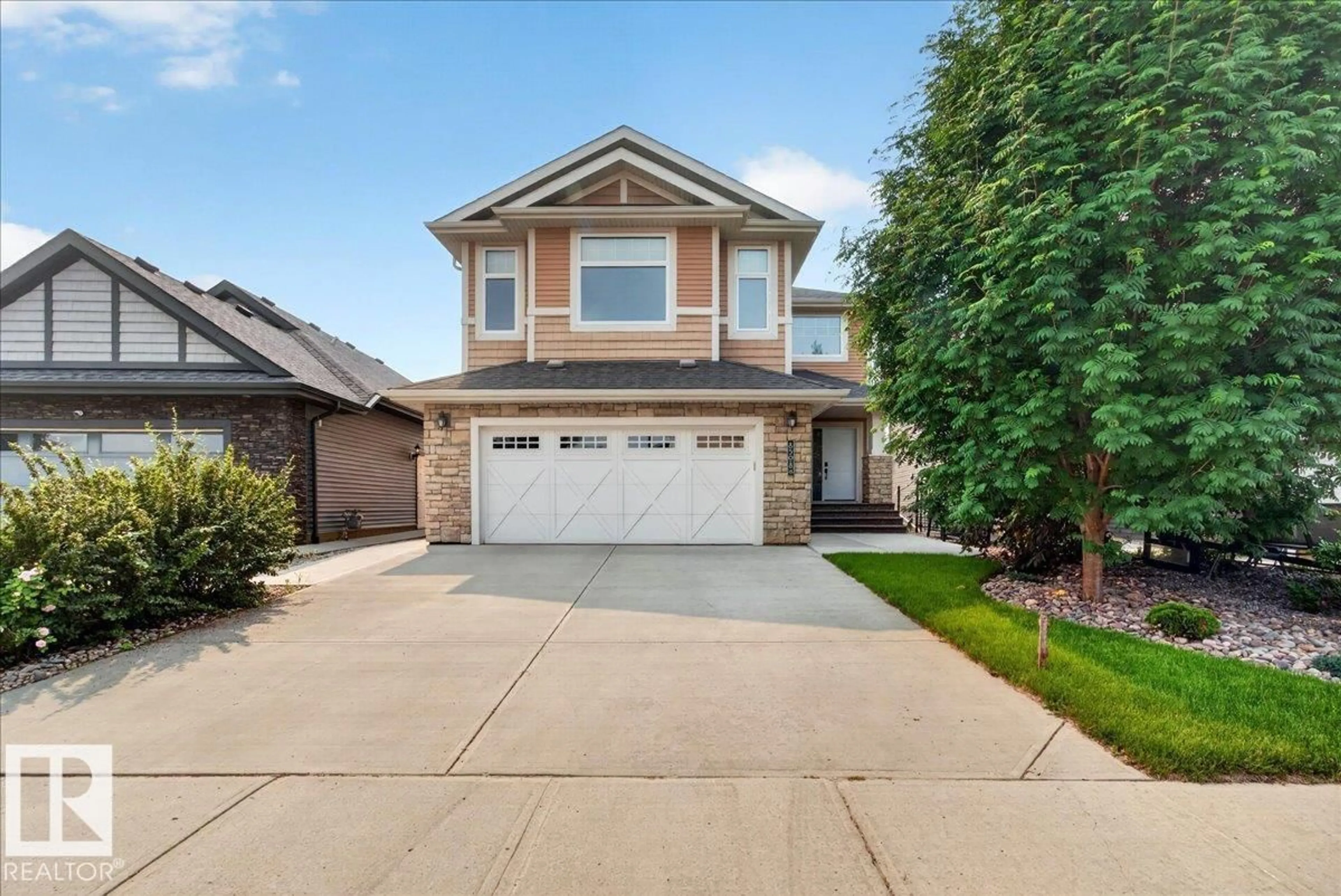Home with brick exterior material, street for NW - 8508 218 ST, Edmonton Alberta T5T4R9