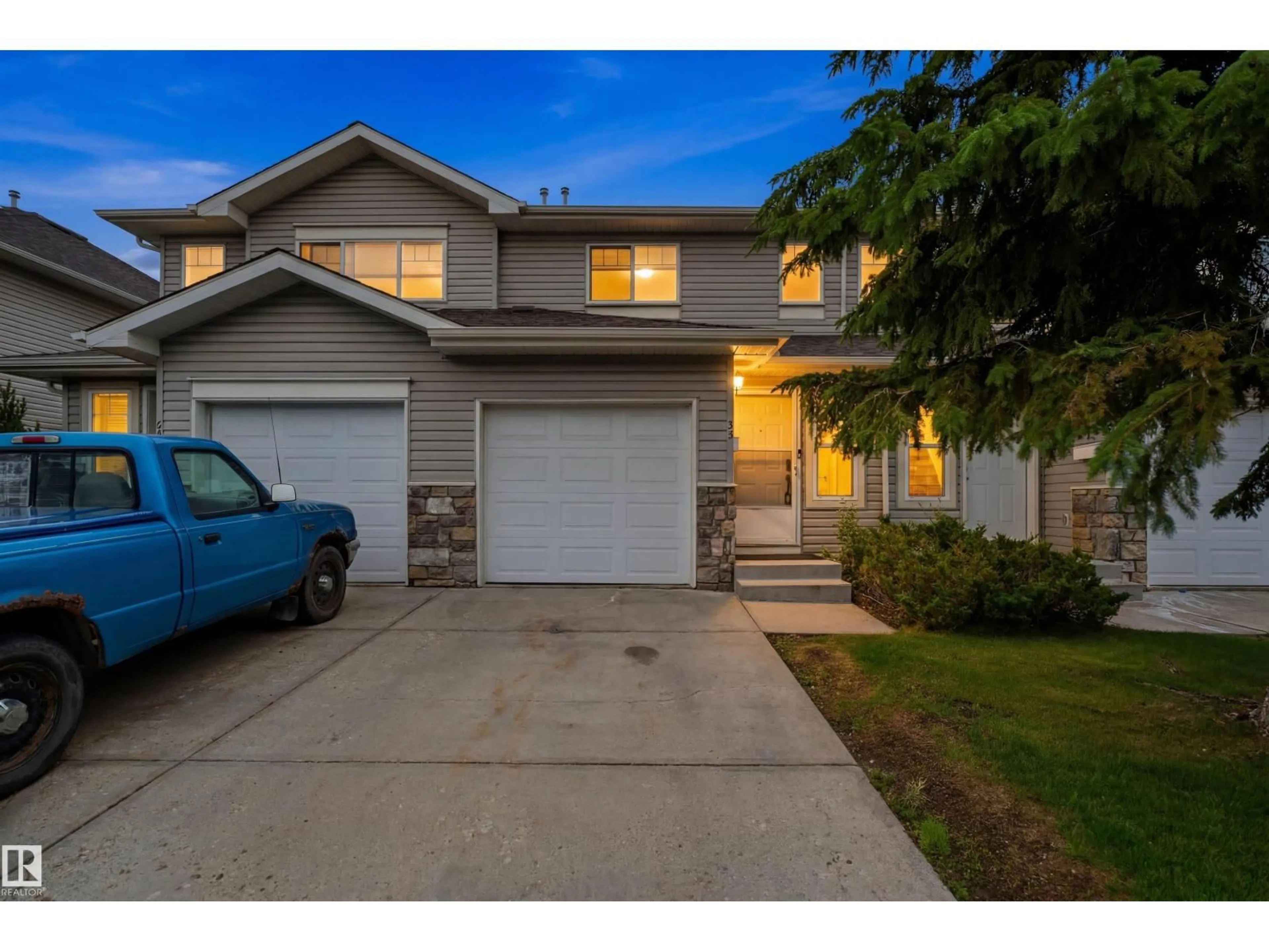 Home with vinyl exterior material, street for 230 - 92 EDWARDS DRIVE, Edmonton Alberta T6X1G7