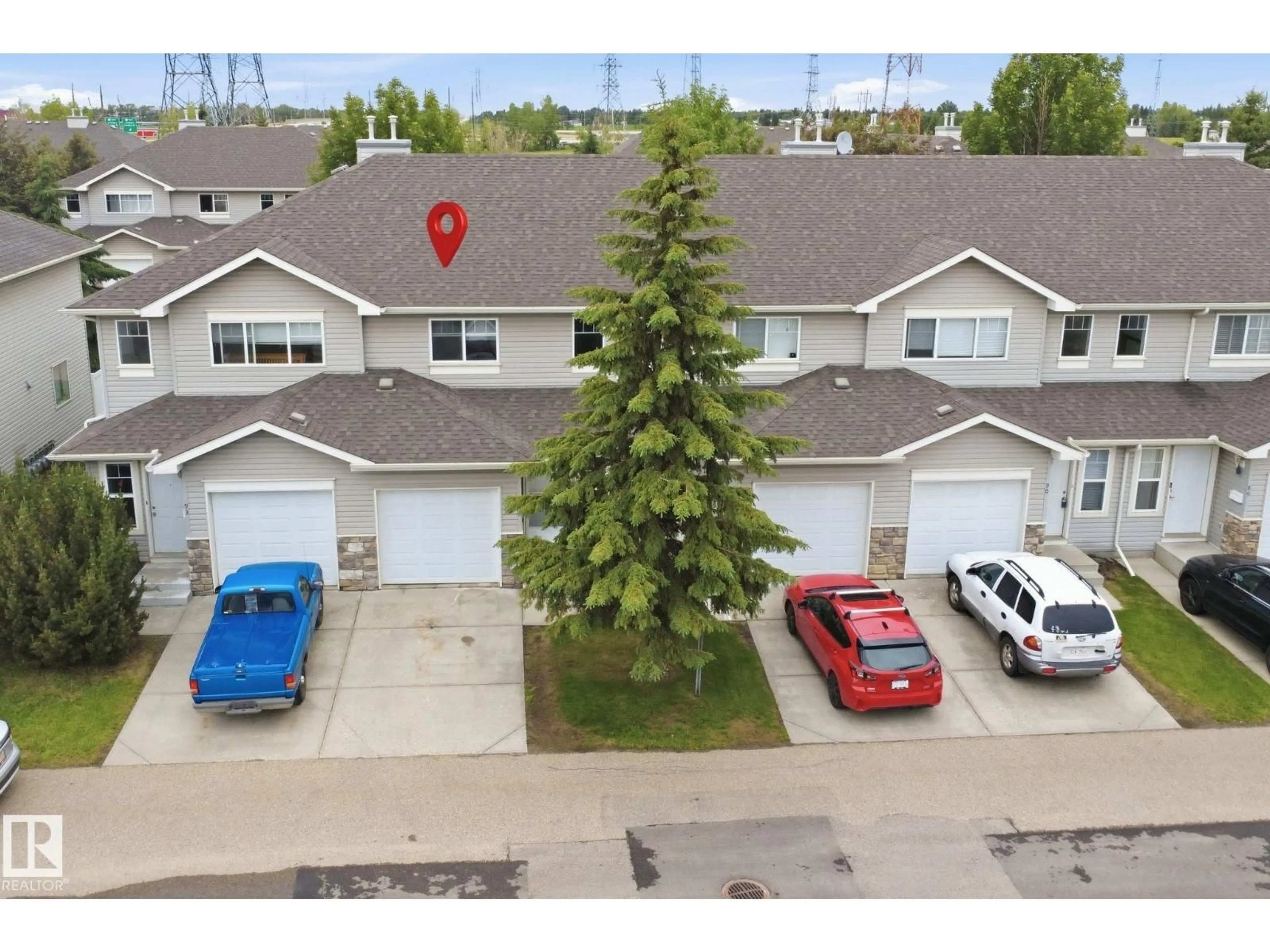 A pic from outside/outdoor area/front of a property/back of a property/a pic from drone, street for 230 - 92 EDWARDS DRIVE, Edmonton Alberta T6X1G7