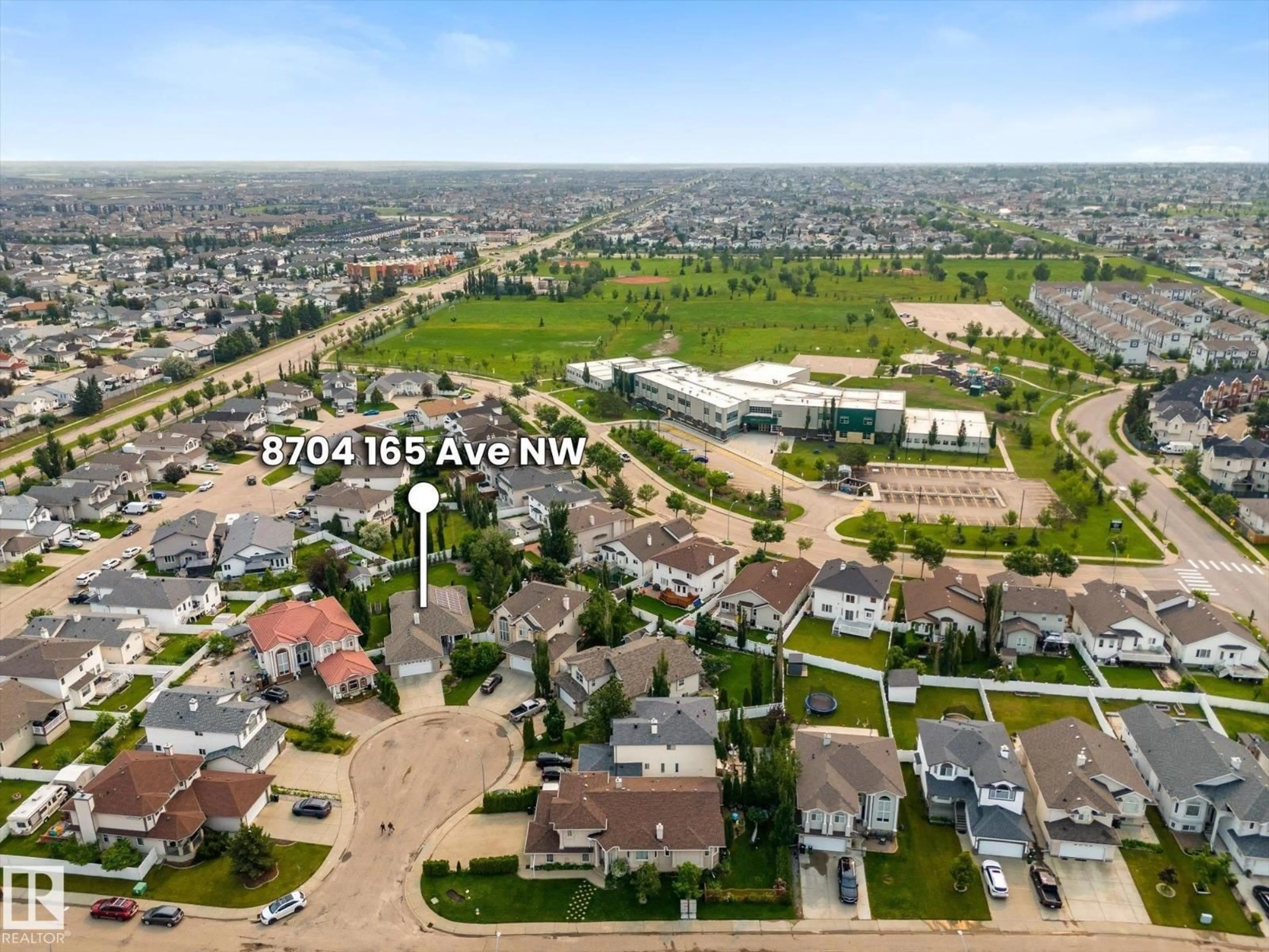 A pic from outside/outdoor area/front of a property/back of a property/a pic from drone, unknown for NW - 8704 165 AV, Edmonton Alberta T5Z3W9