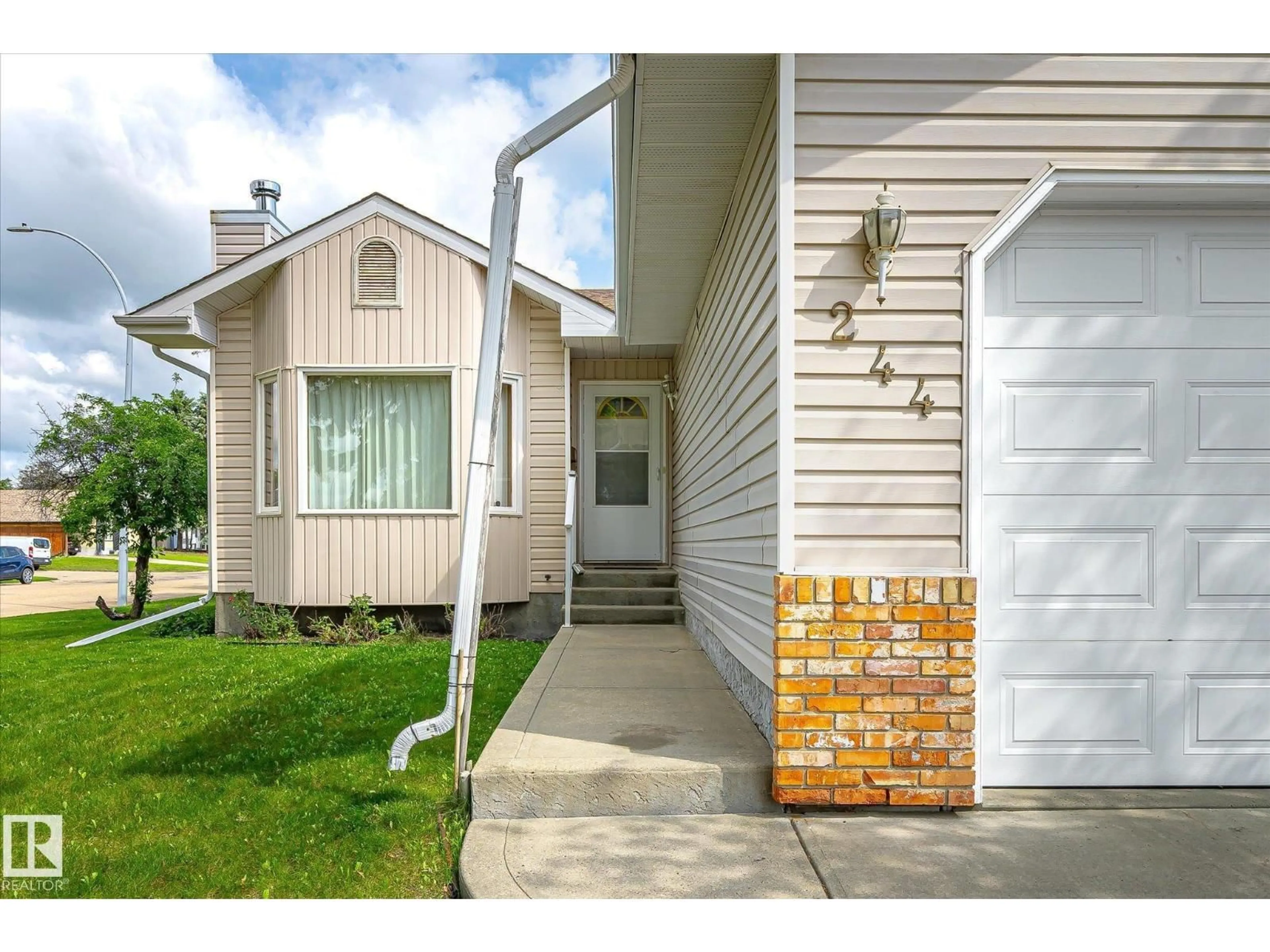 Home with vinyl exterior material, street for 244 NORTHMOUNT DR, Wetaskiwin Alberta T9A3M4
