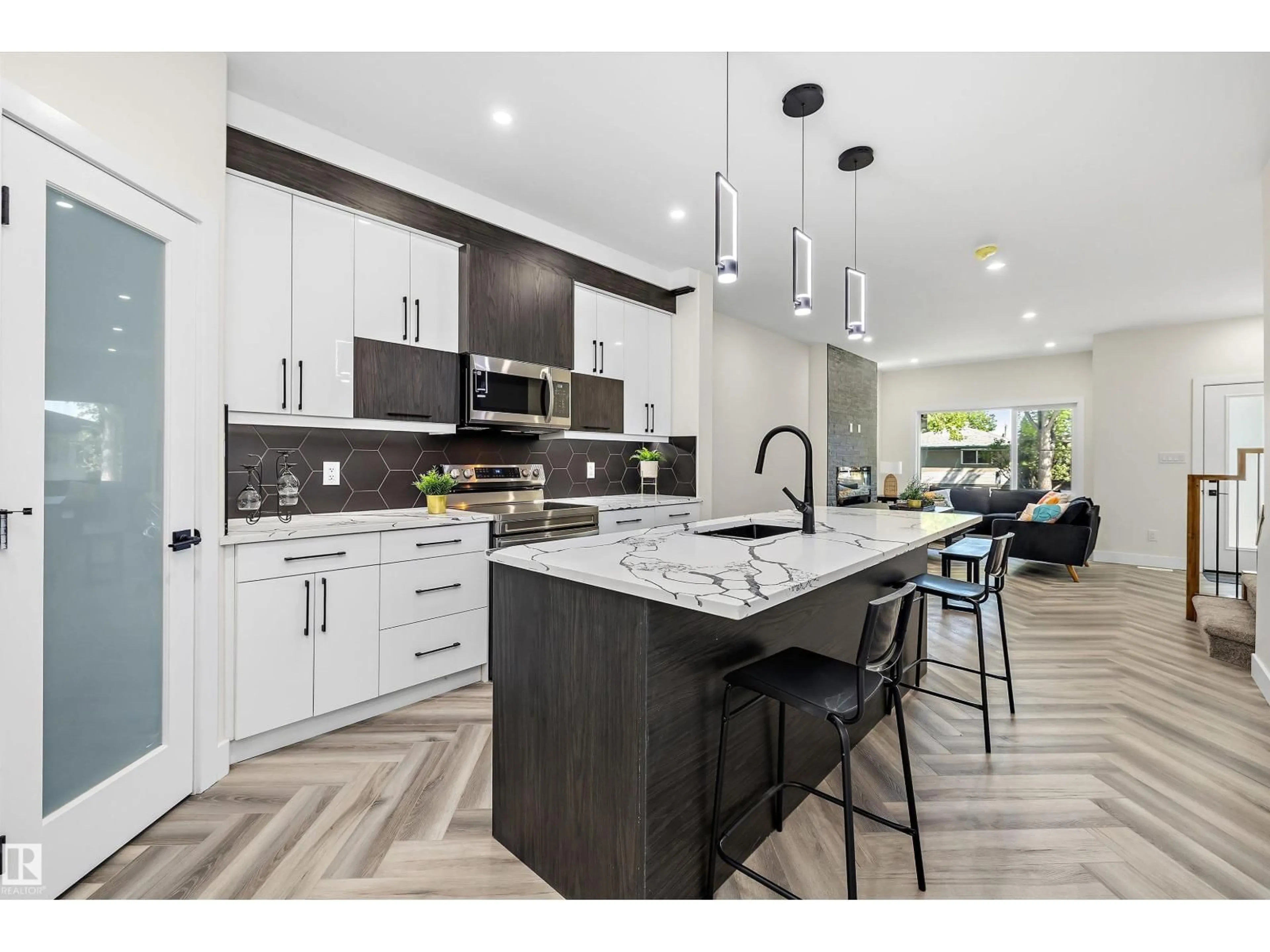 Open concept kitchen, ceramic/tile floor for 8319 81 AV, Edmonton Alberta T6C0W1
