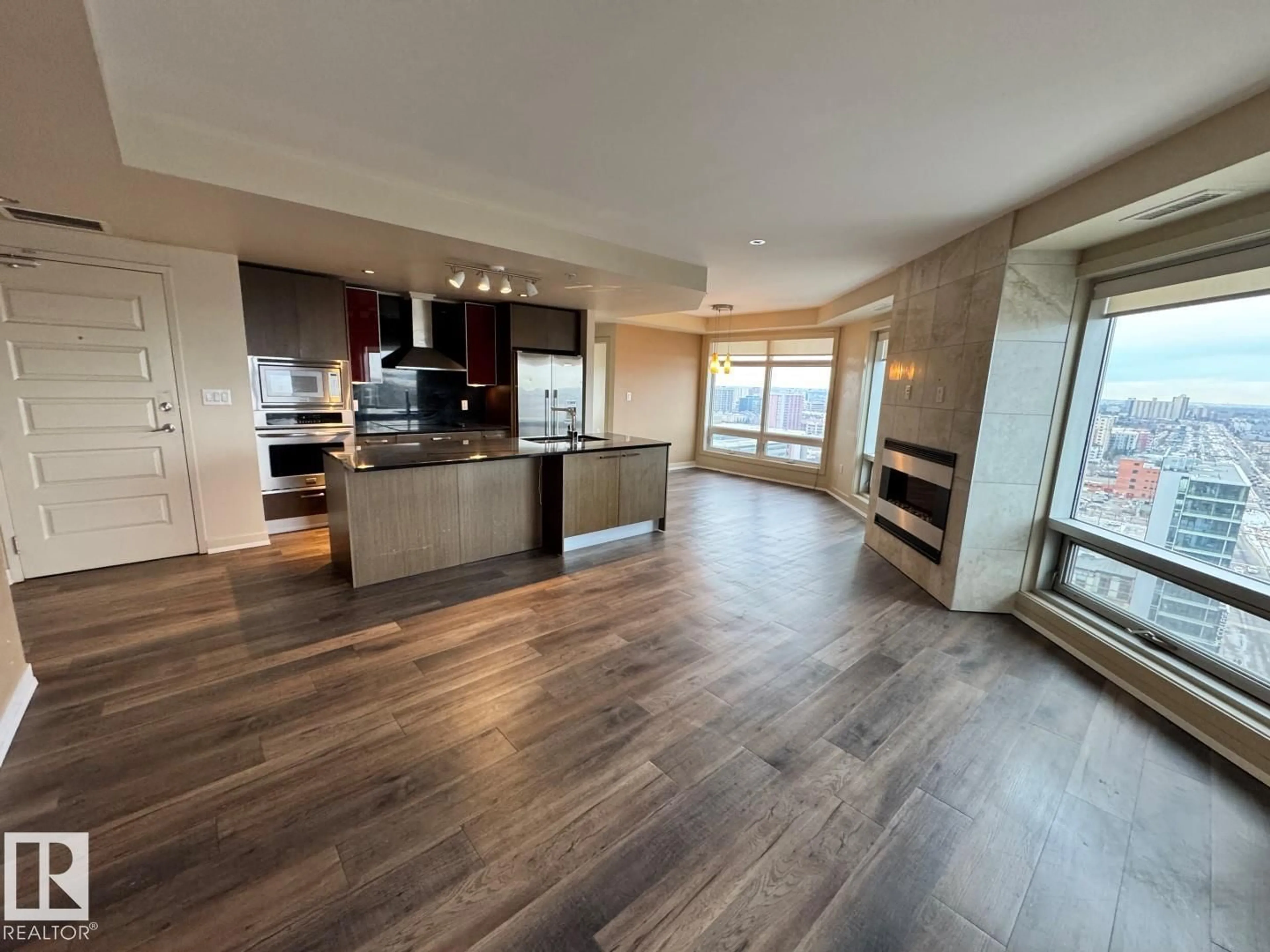 Open concept kitchen, wood/laminate floor for 10388 - 1804 105 ST, Edmonton Alberta T5J0C2