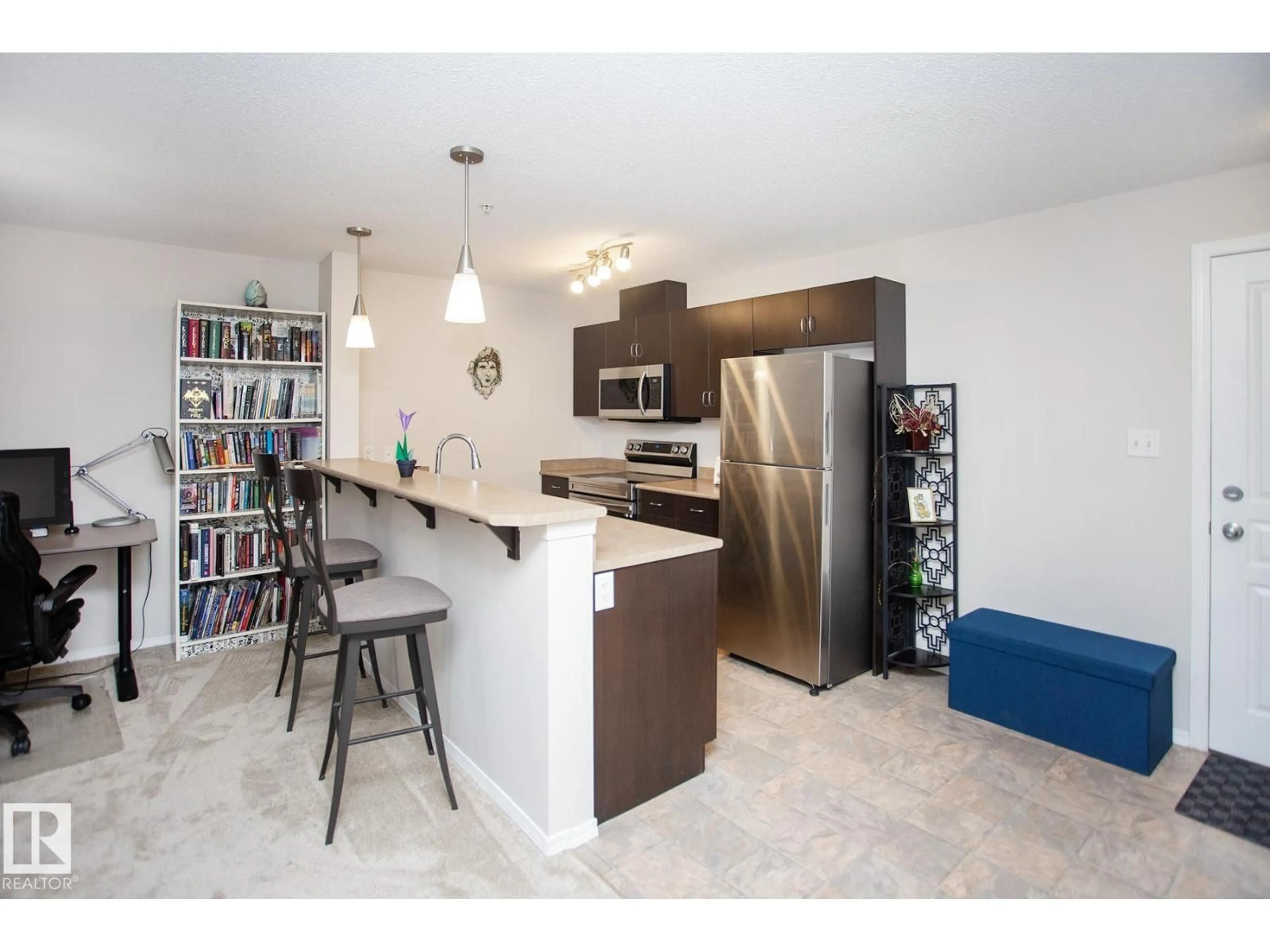 Open concept kitchen, unknown for #235 - 1180 HYNDMAN RD, Edmonton Alberta T5A0P8