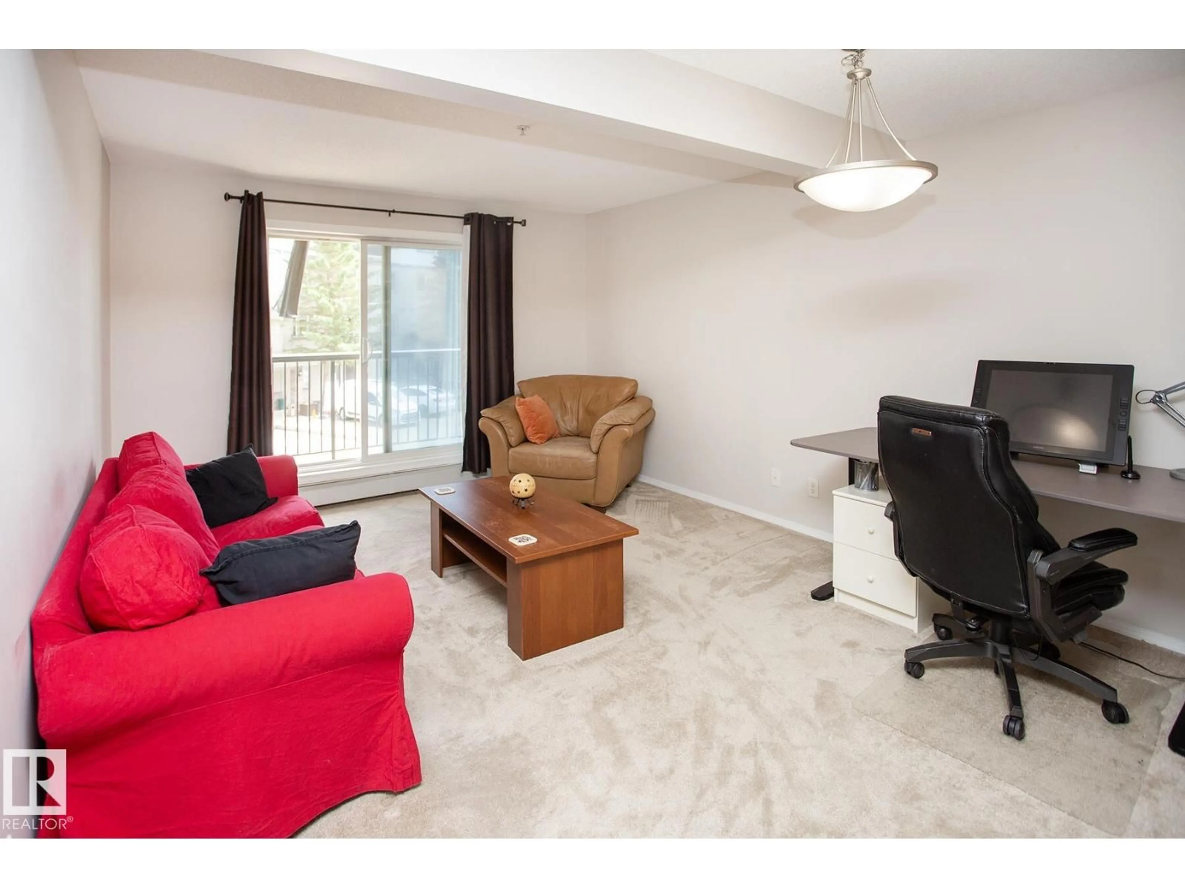 Living room with furniture, unknown for #235 - 1180 HYNDMAN RD, Edmonton Alberta T5A0P8