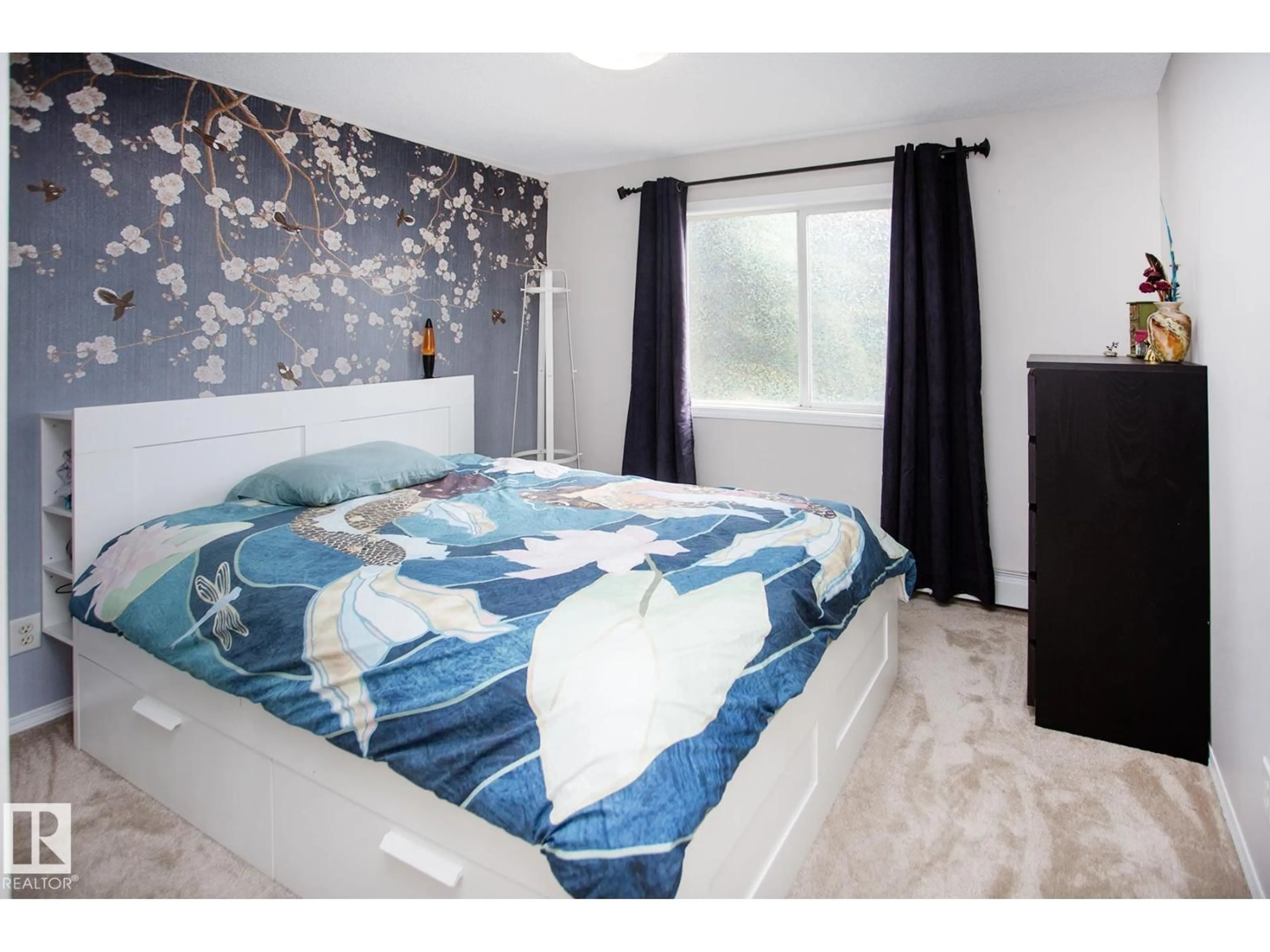 Bedroom with bed, wood/laminate floor for #235 - 1180 HYNDMAN RD, Edmonton Alberta T5A0P8