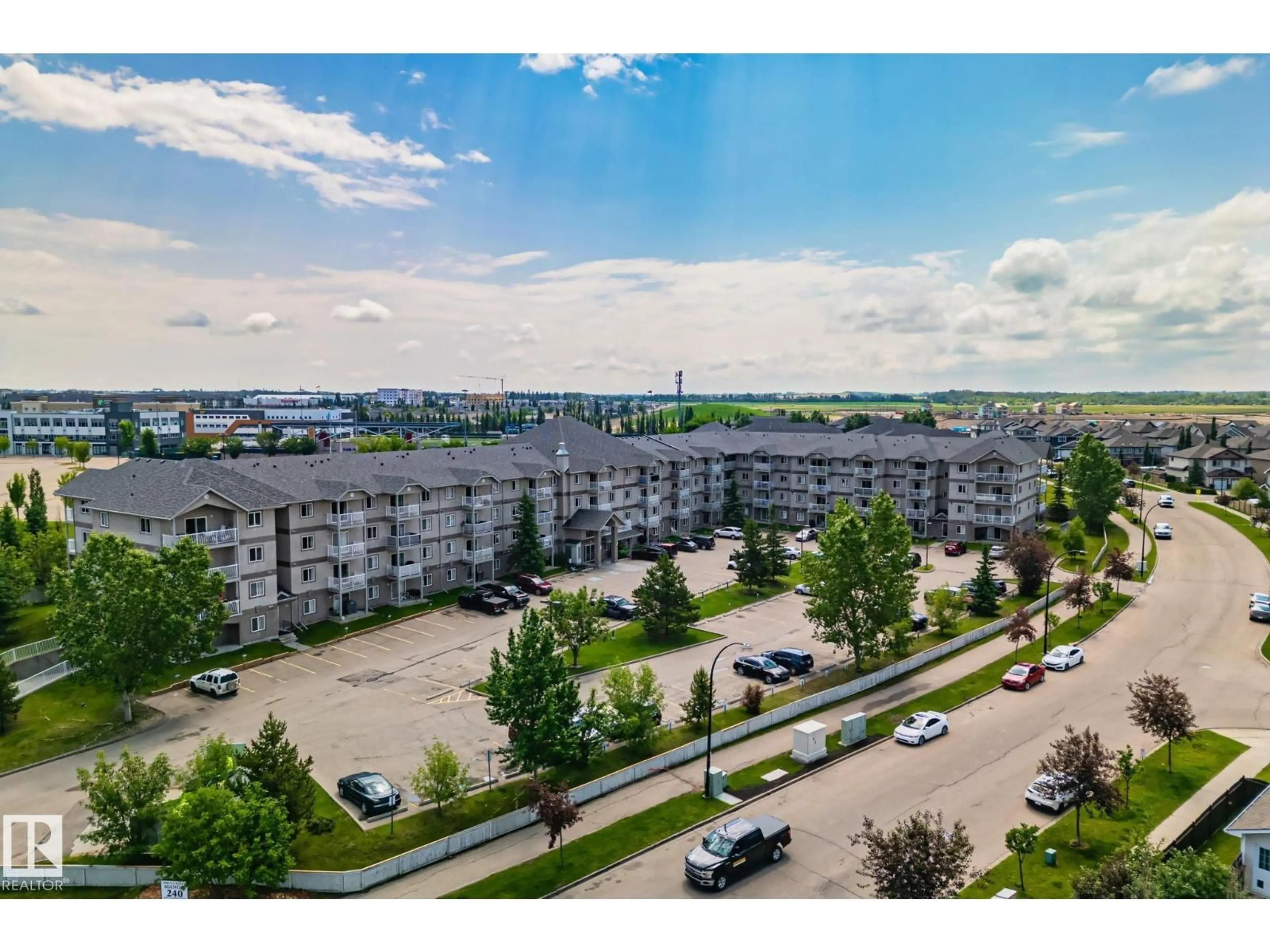 A pic from outside/outdoor area/front of a property/back of a property/a pic from drone, city buildings view from balcony for #209 - 240 SPRUCE RIDGE RD, Spruce Grove Alberta T7X0G5