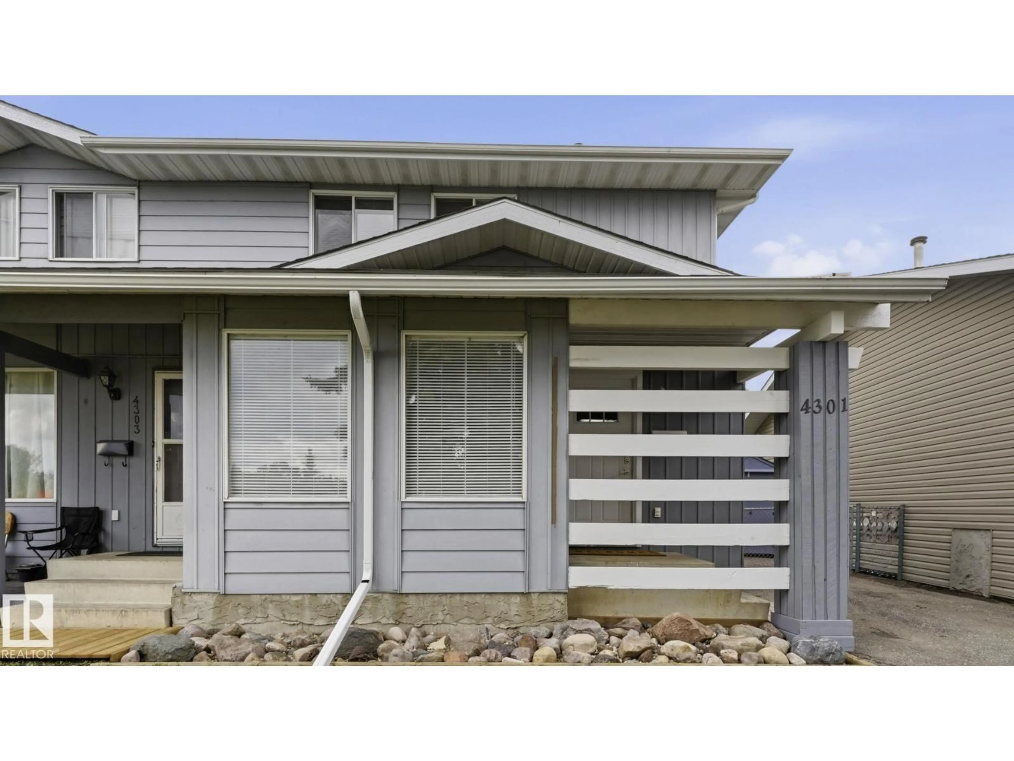 Home with vinyl exterior material, street for 4301 44 ST, Beaumont Alberta T4X1C7