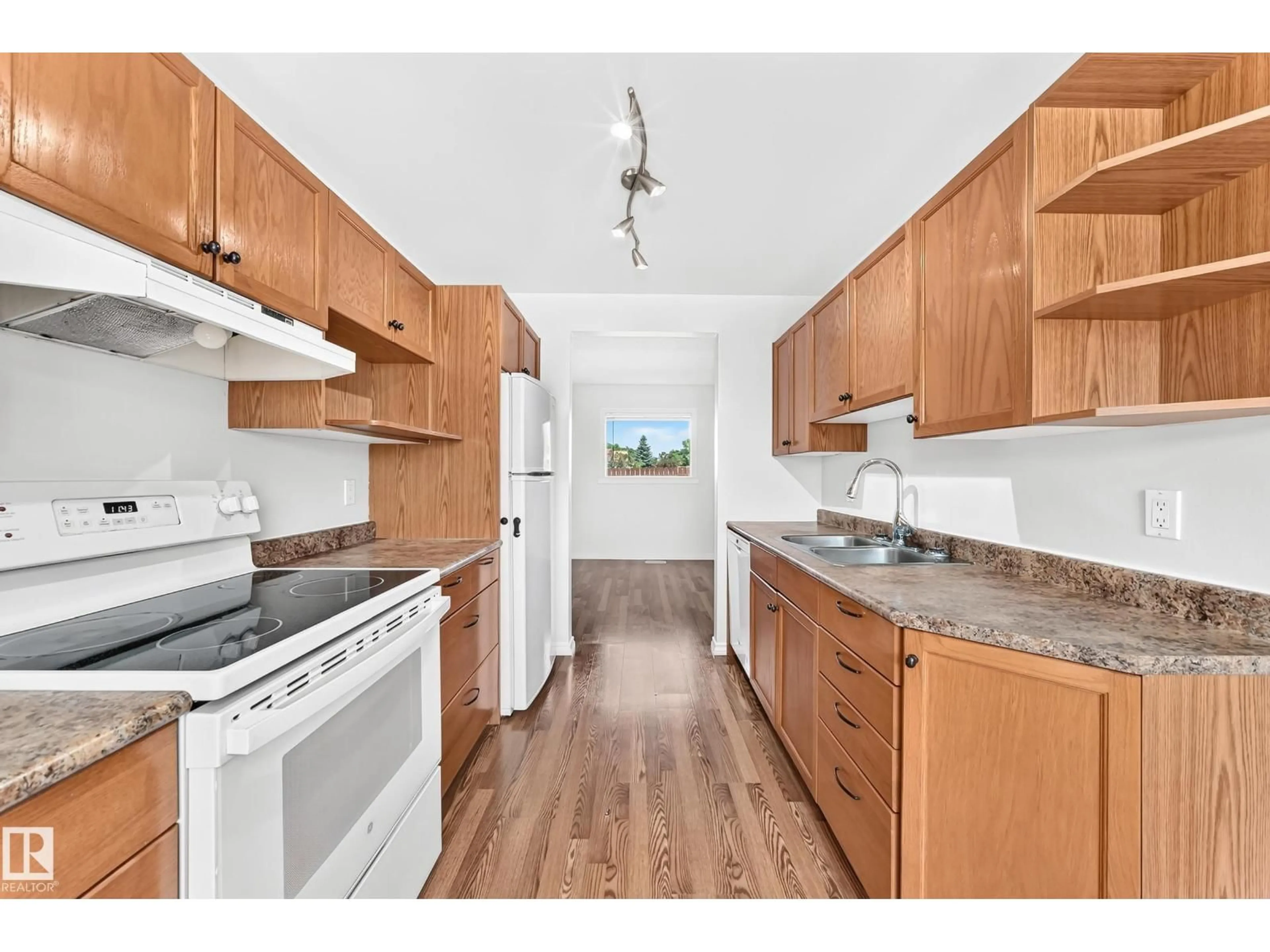 Standard kitchen, wood/laminate floor for 1102 MILLBOURNE RD E NW, Edmonton Alberta T6K1W1