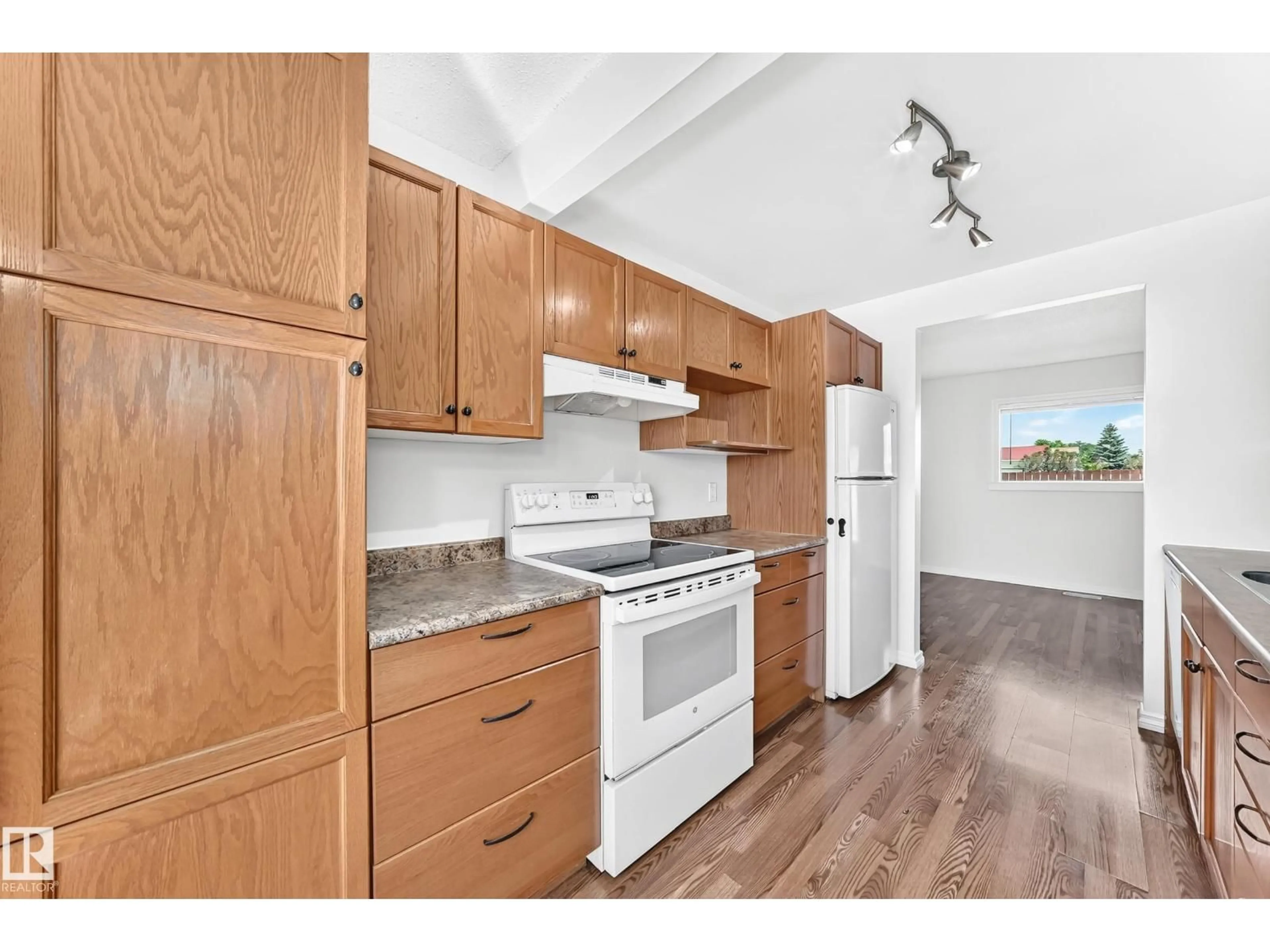 Standard kitchen, wood/laminate floor for 1102 MILLBOURNE RD E NW, Edmonton Alberta T6K1W1