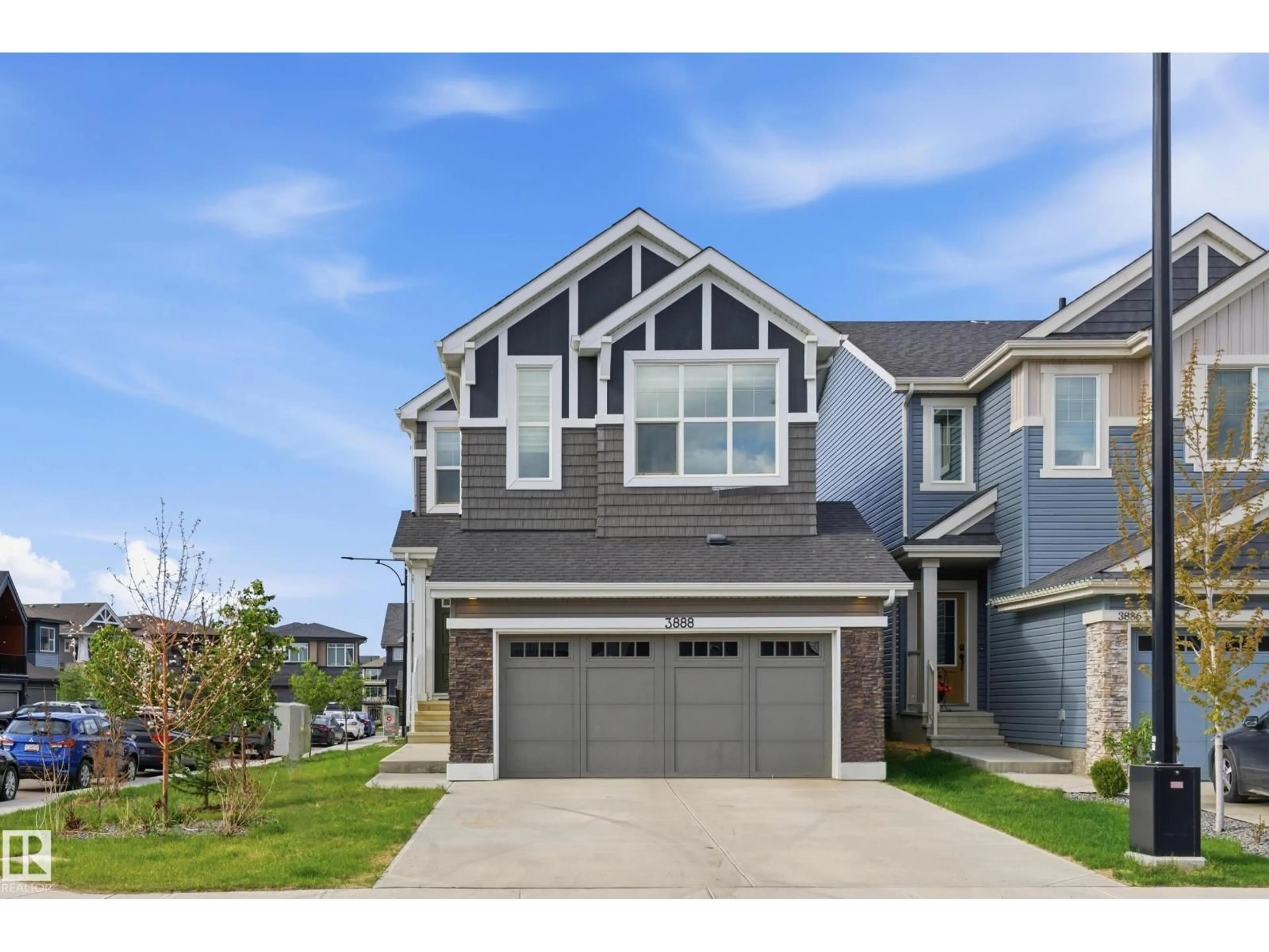 Home with vinyl exterior material, street for SW SW - 3888 CHRUSTAWKA PL, Edmonton Alberta T6W5B2