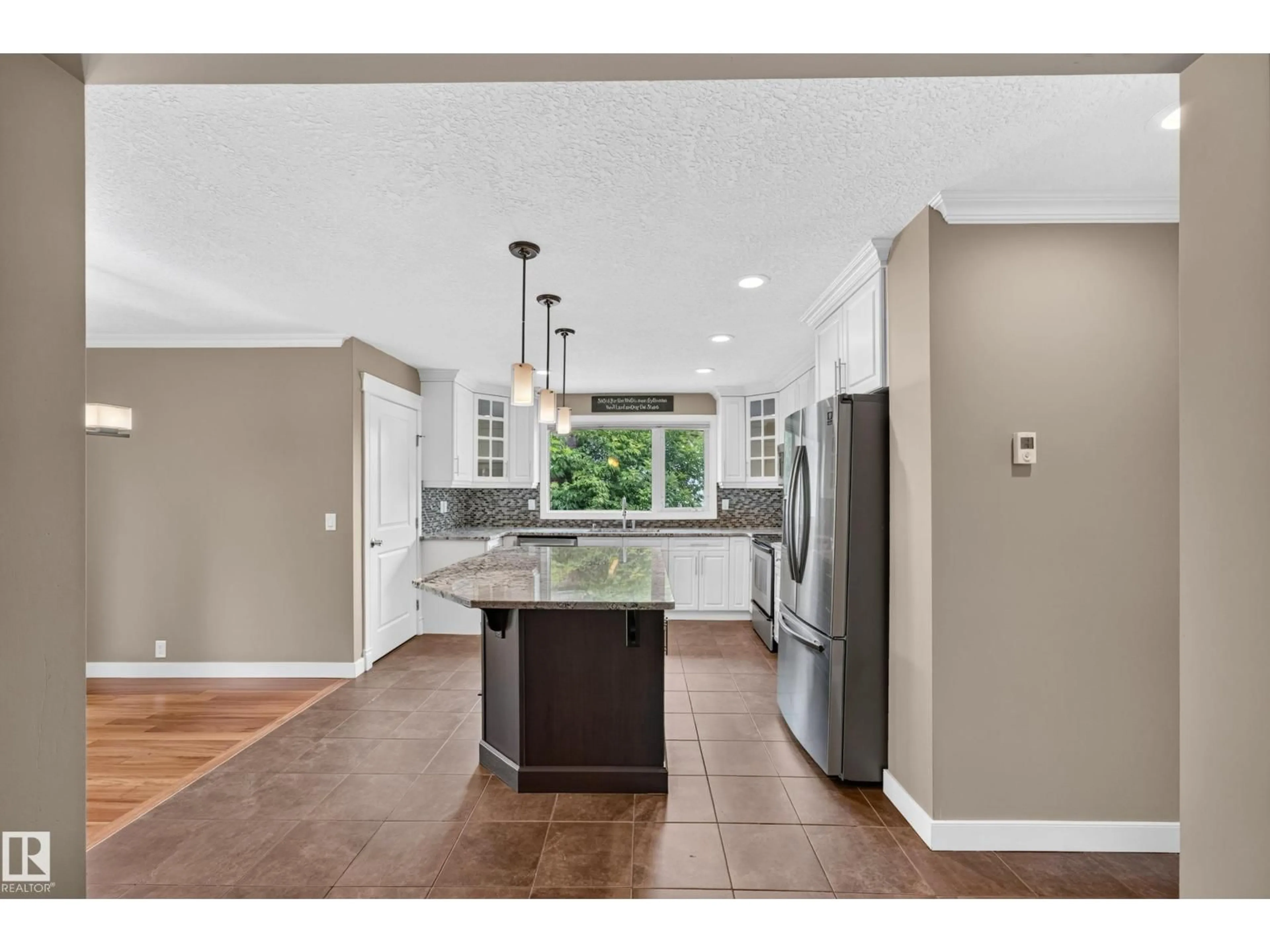 Open concept kitchen, ceramic/tile floor for NW - 12819 45 ST, Edmonton Alberta T5A2K3