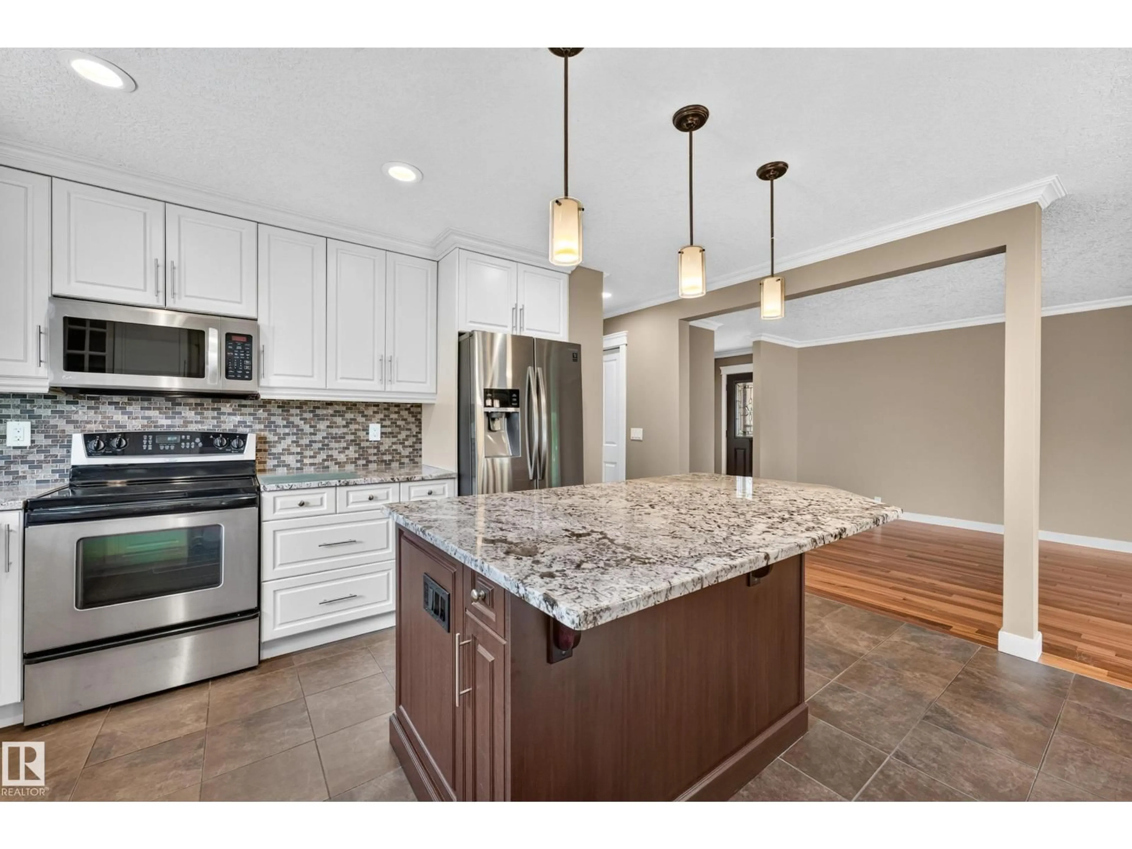 Open concept kitchen, ceramic/tile floor for NW - 12819 45 ST, Edmonton Alberta T5A2K3