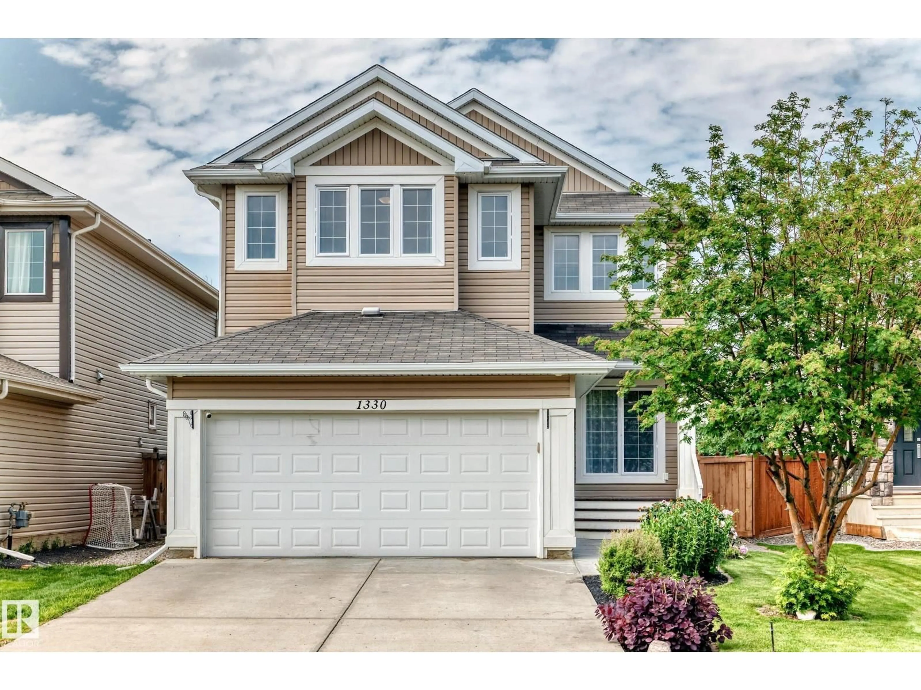 Home with vinyl exterior material, street for SW - 1330 114B ST, Edmonton Alberta T6W0G7