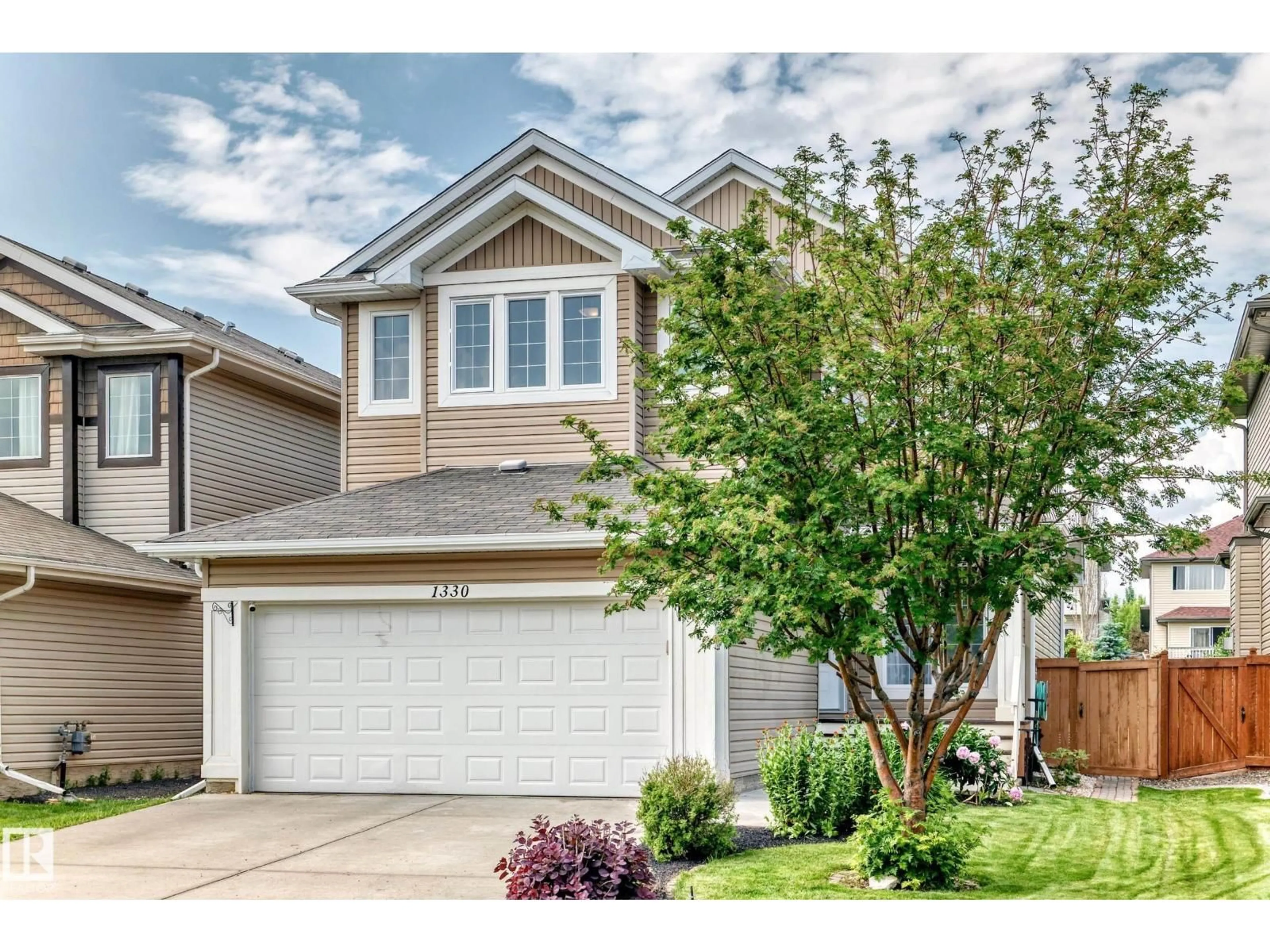 Home with vinyl exterior material, street for SW - 1330 114B ST, Edmonton Alberta T6W0G7