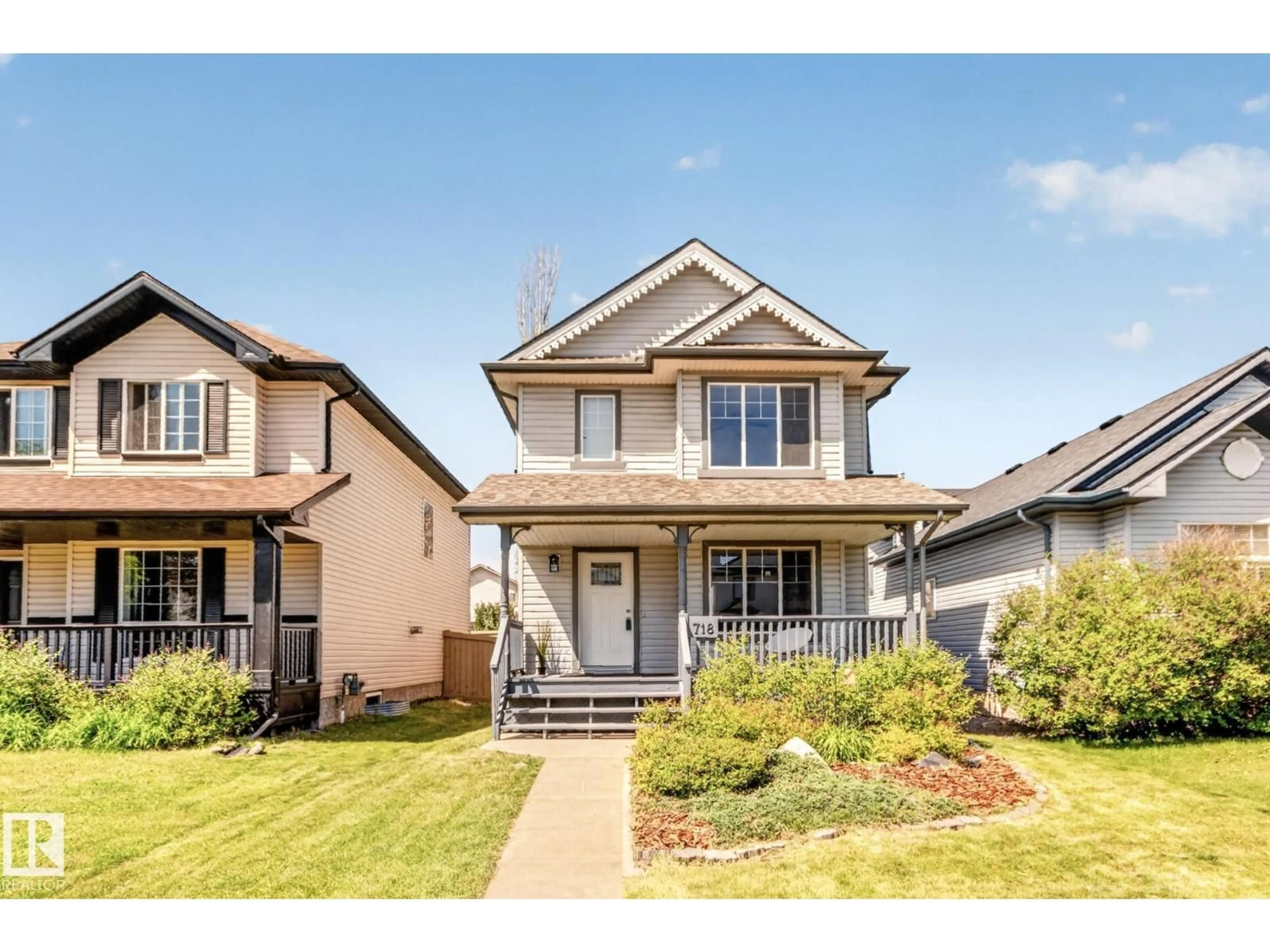 Home with brick exterior material, street for SW - 718 88A ST, Edmonton Alberta T6X1C4