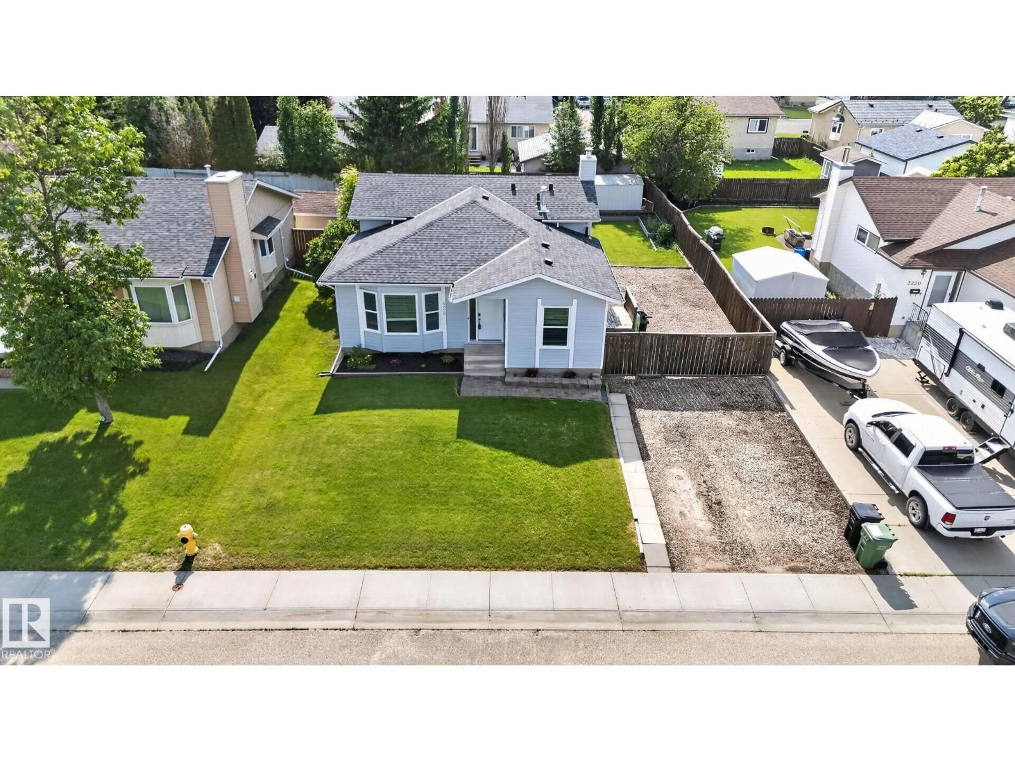 A pic from outside/outdoor area/front of a property/back of a property/a pic from drone, street for 3218 41 ST, Leduc Alberta T9E6B9