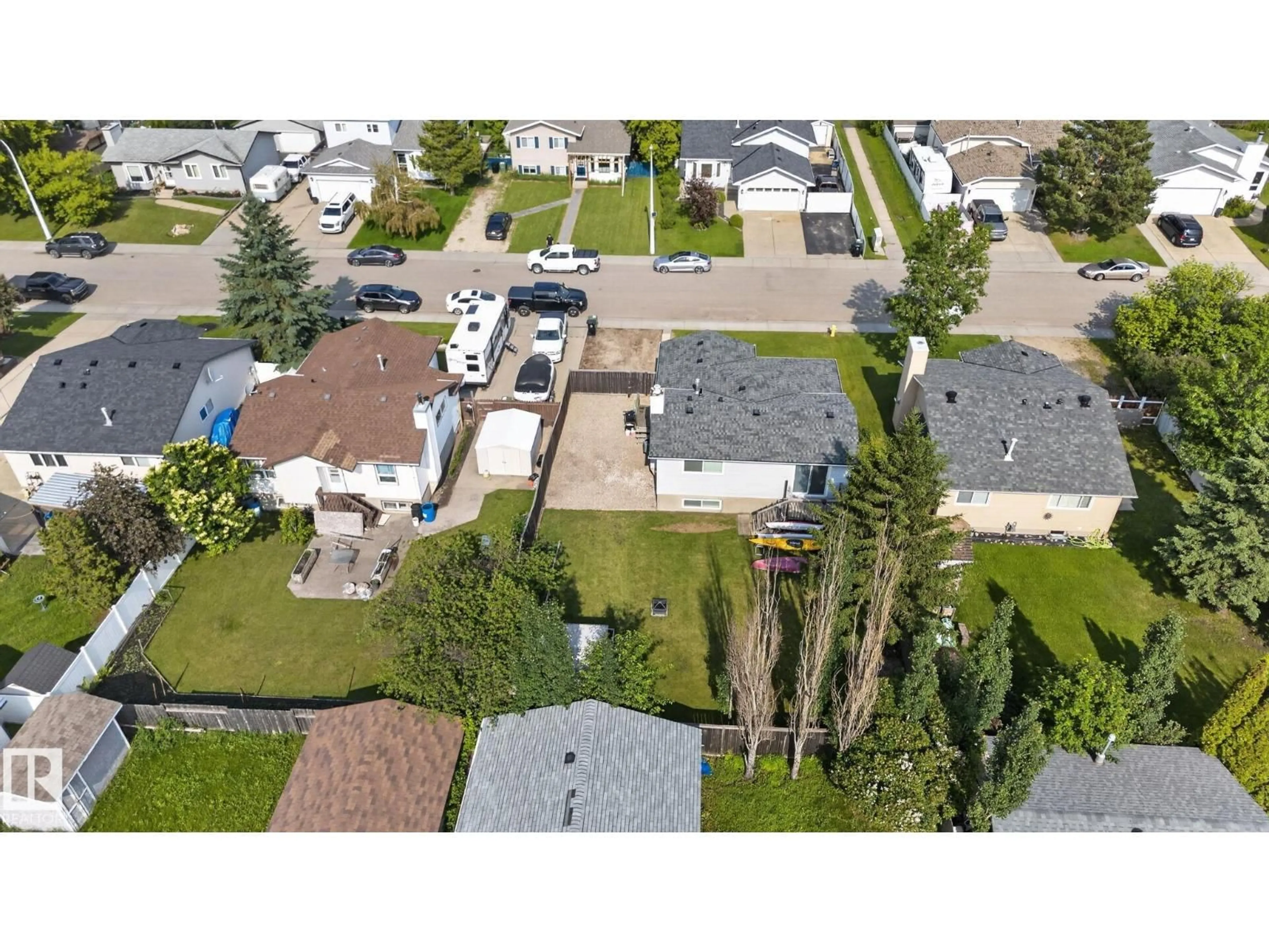 A pic from outside/outdoor area/front of a property/back of a property/a pic from drone, street for 3218 41 ST, Leduc Alberta T9E6B9