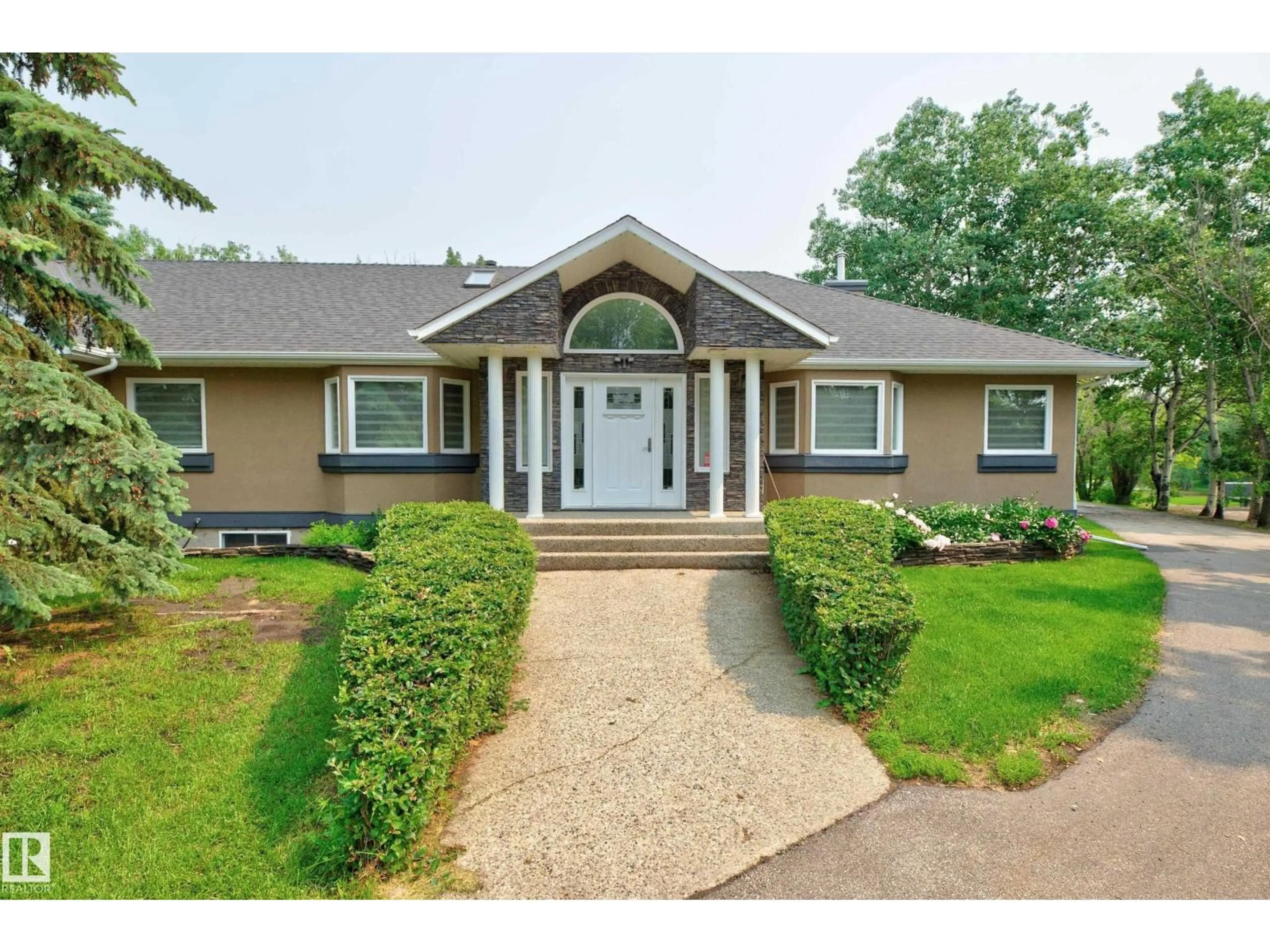Home with vinyl exterior material, street for 349 52471 RGE ROAD RGE ROAD, Rural Strathcona County Alberta T8A4P7