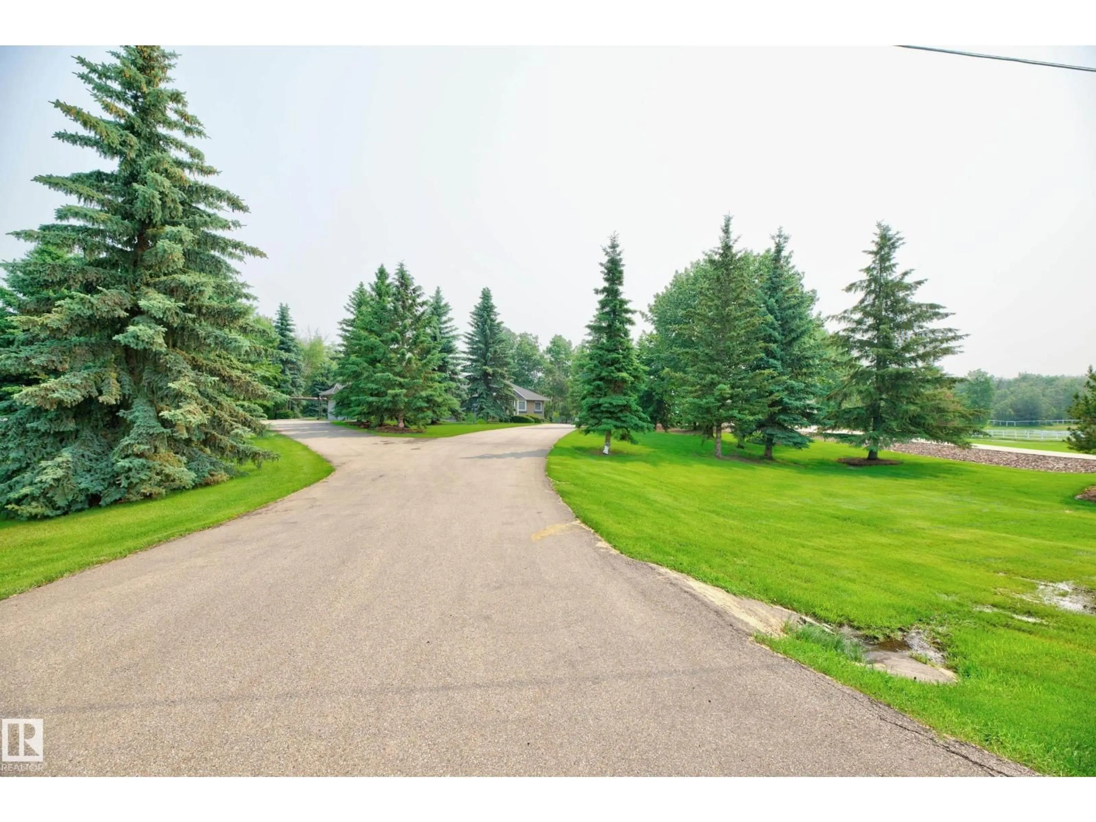 A pic from outside/outdoor area/front of a property/back of a property/a pic from drone, unknown for 349 52471 RGE ROAD RGE ROAD, Rural Strathcona County Alberta T8A4P7