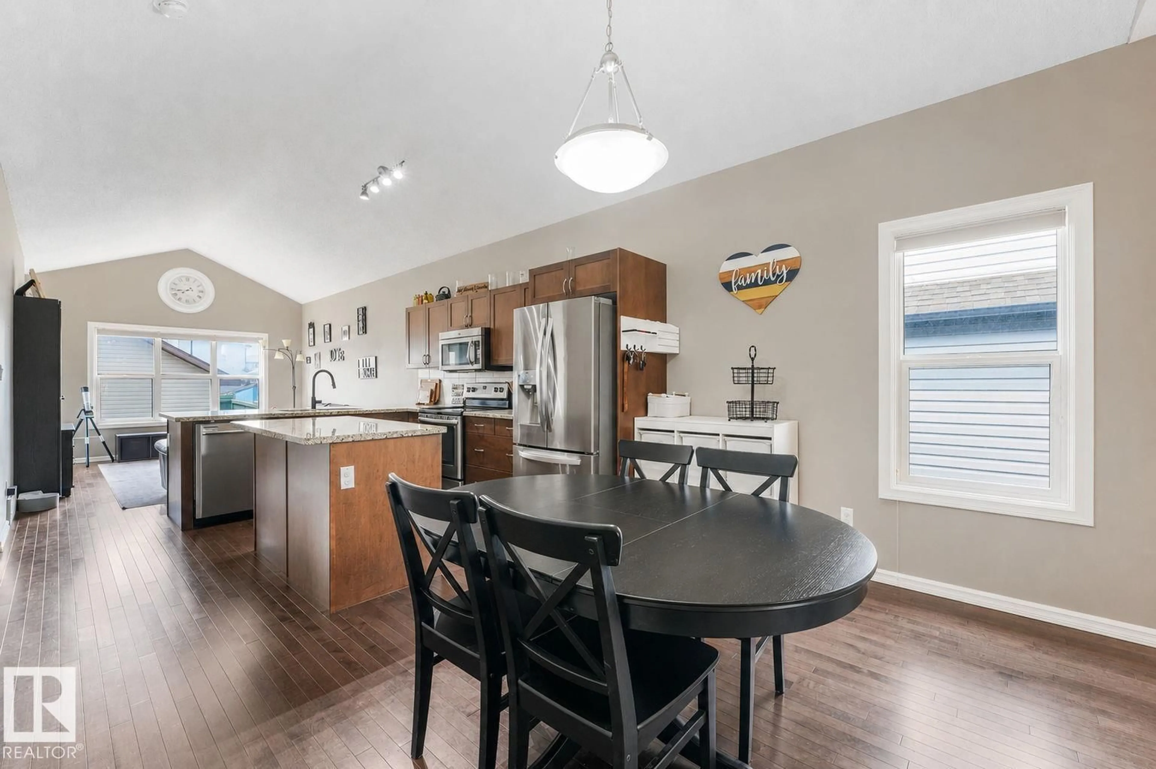 Open concept kitchen, wood/laminate floor for 21219 96 AV, Edmonton Alberta T5T4H1