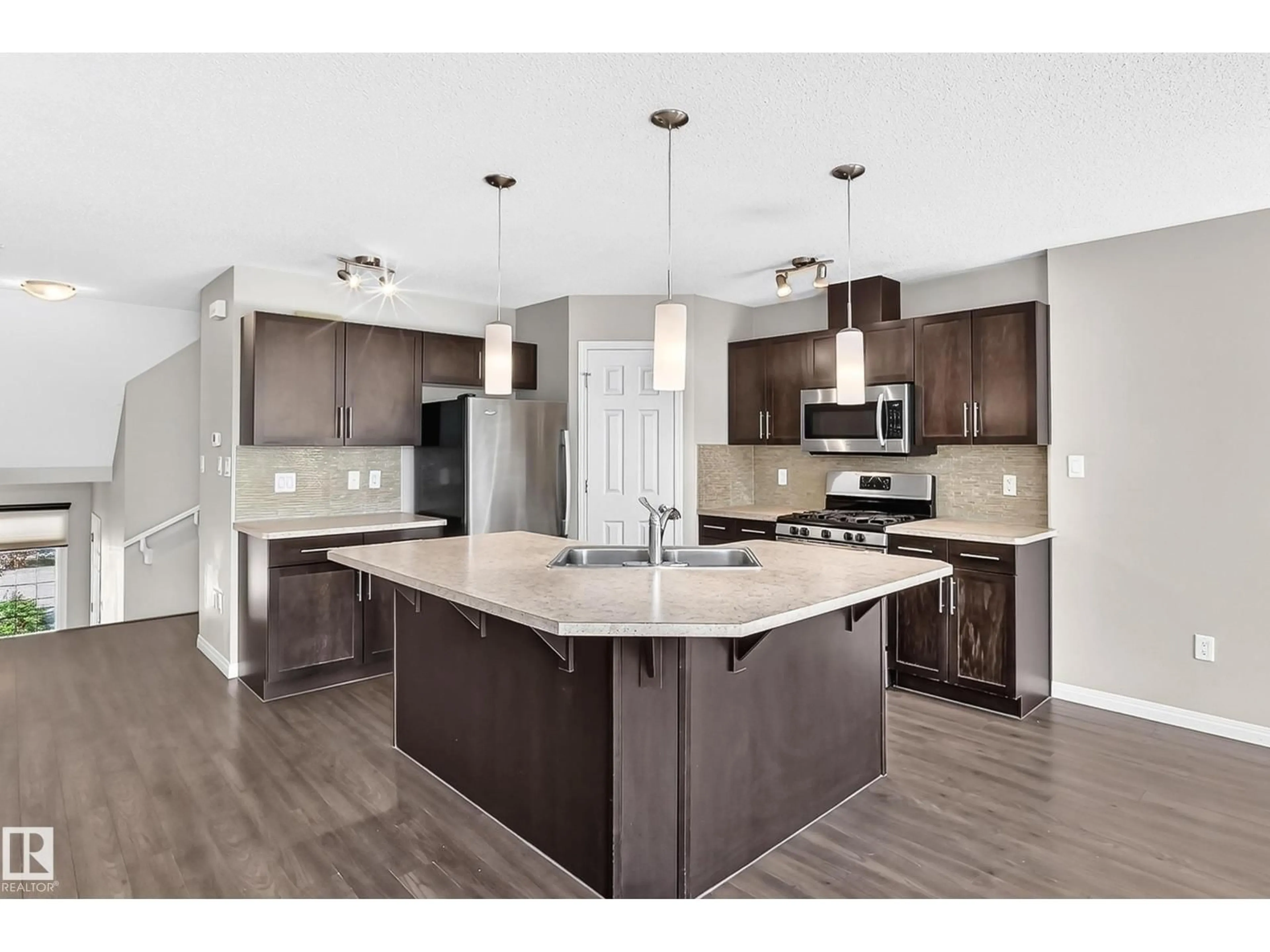 Open concept kitchen, unknown for 1941 CHAPMAN RD, Edmonton Alberta T6W0Y7