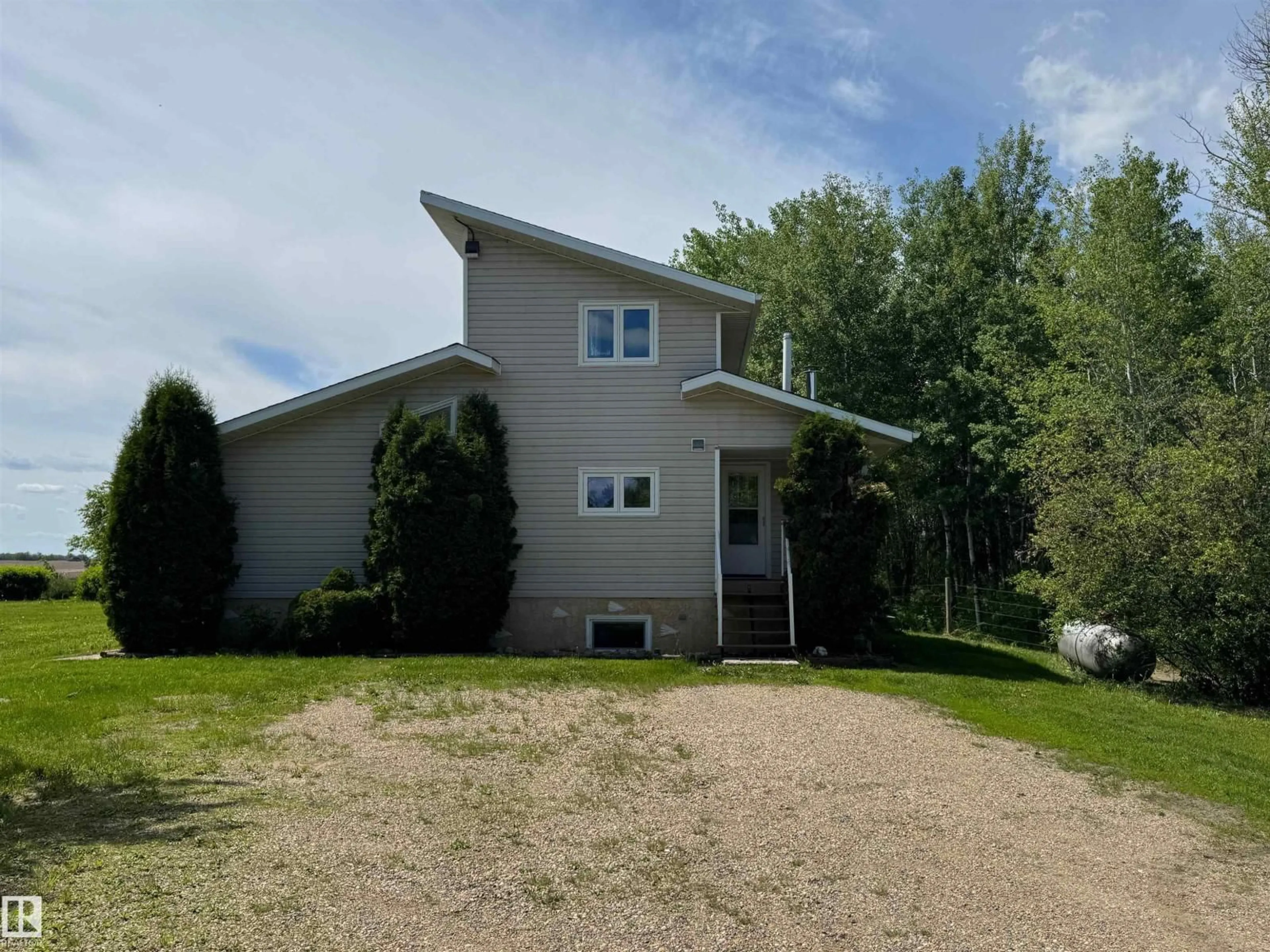 A pic from outside/outdoor area/front of a property/back of a property/a pic from drone, unknown for 59416 RNG RD 94, Rural St. Paul County Alberta T0A3A0