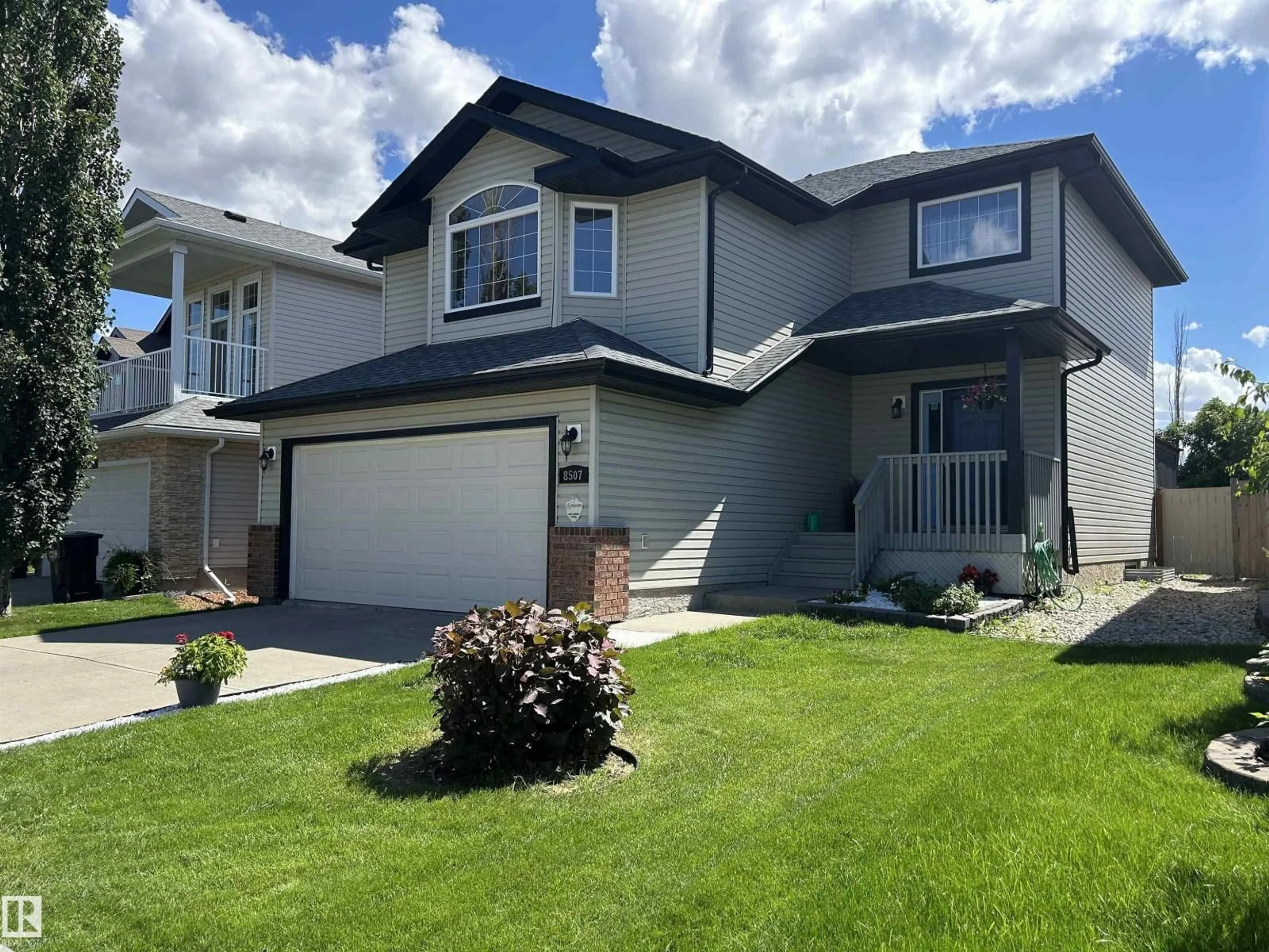 Home with vinyl exterior material, street for 8507 179 AV, Edmonton Alberta T5Z0C1