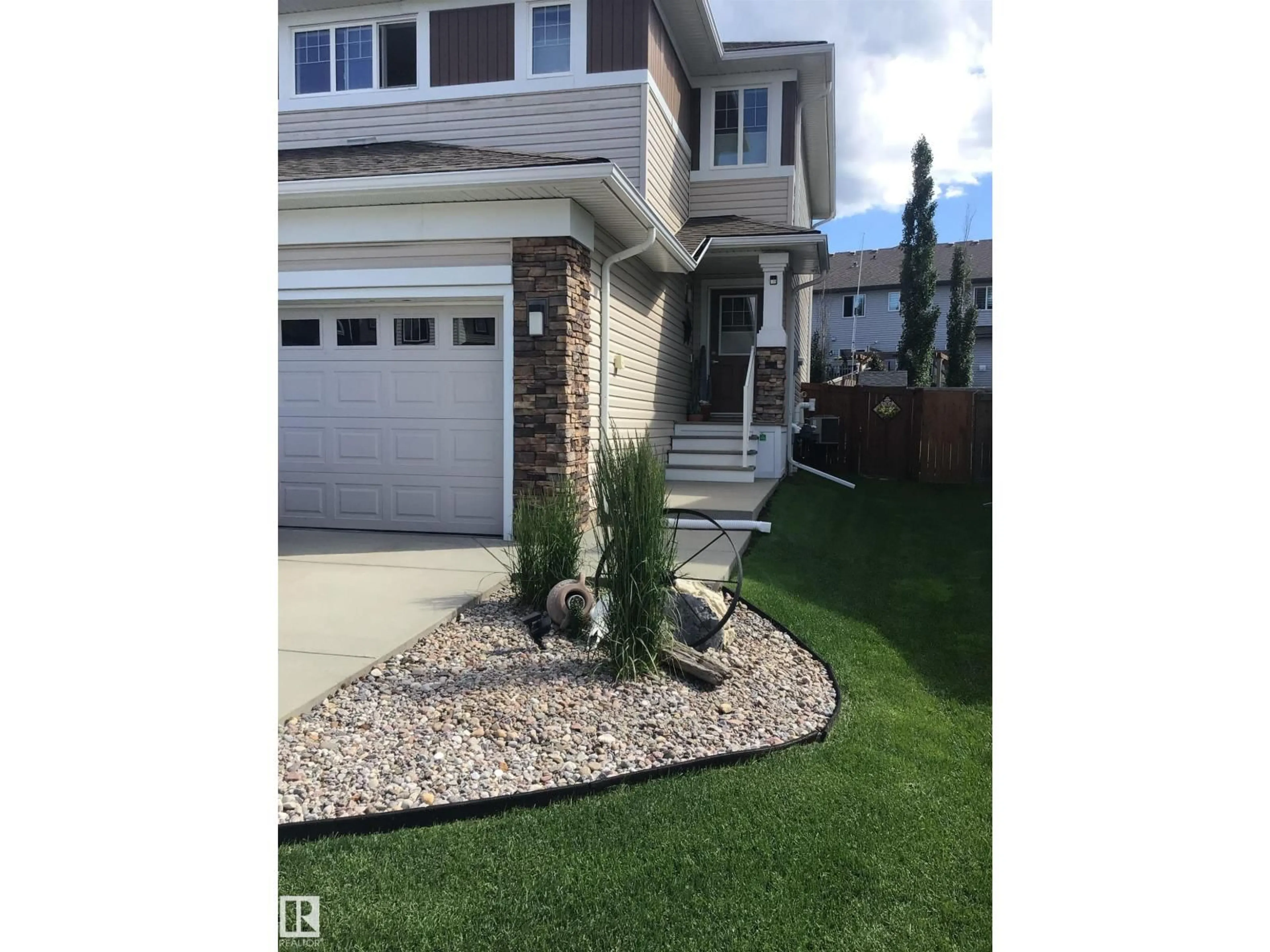 Home with vinyl exterior material, street for 145 SUMMERSTONE LN, Sherwood Park Alberta T8H0Y4