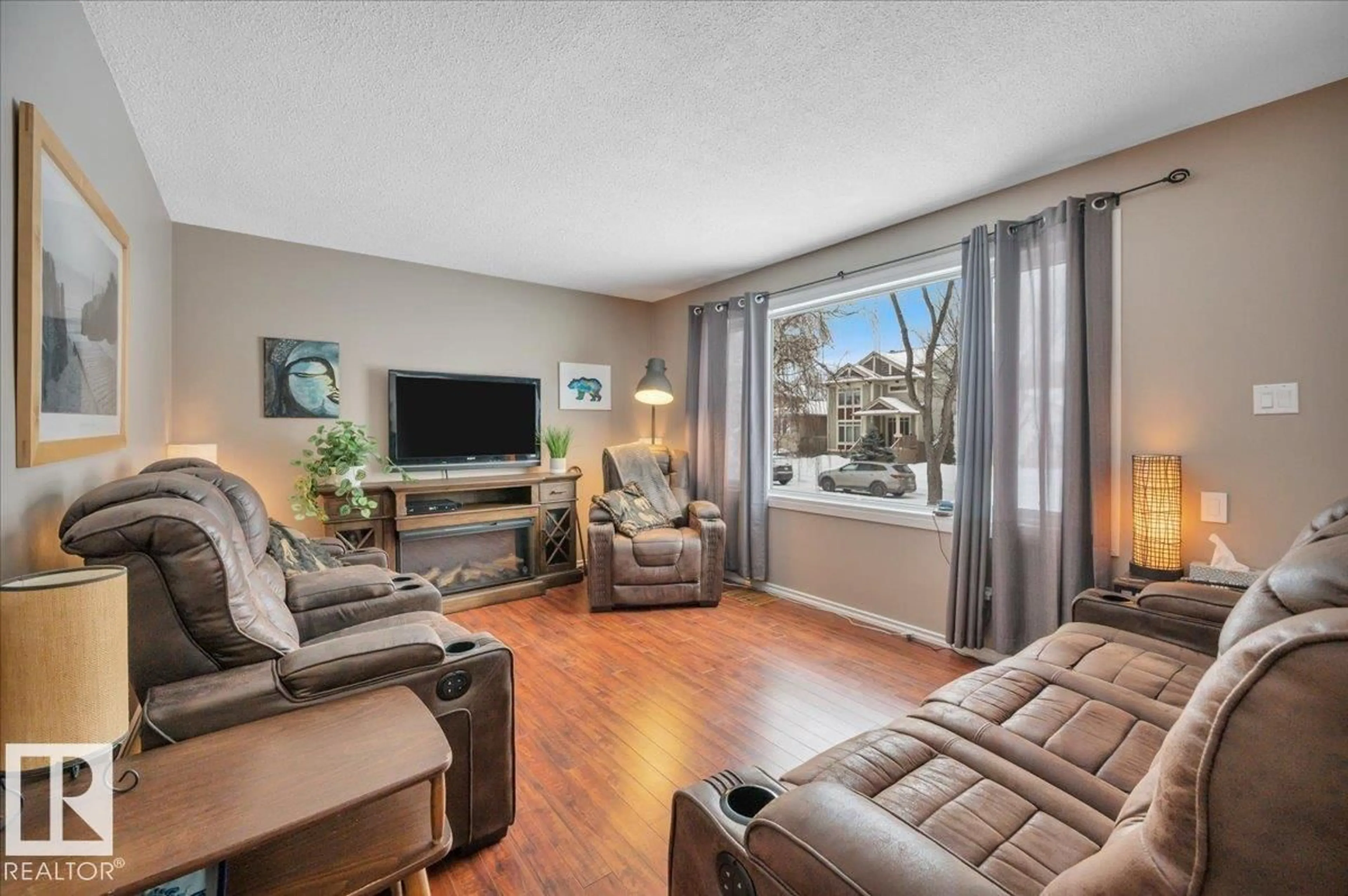 Living room with furniture, unknown for 7934 81 AV, Edmonton Alberta T6C0V7
