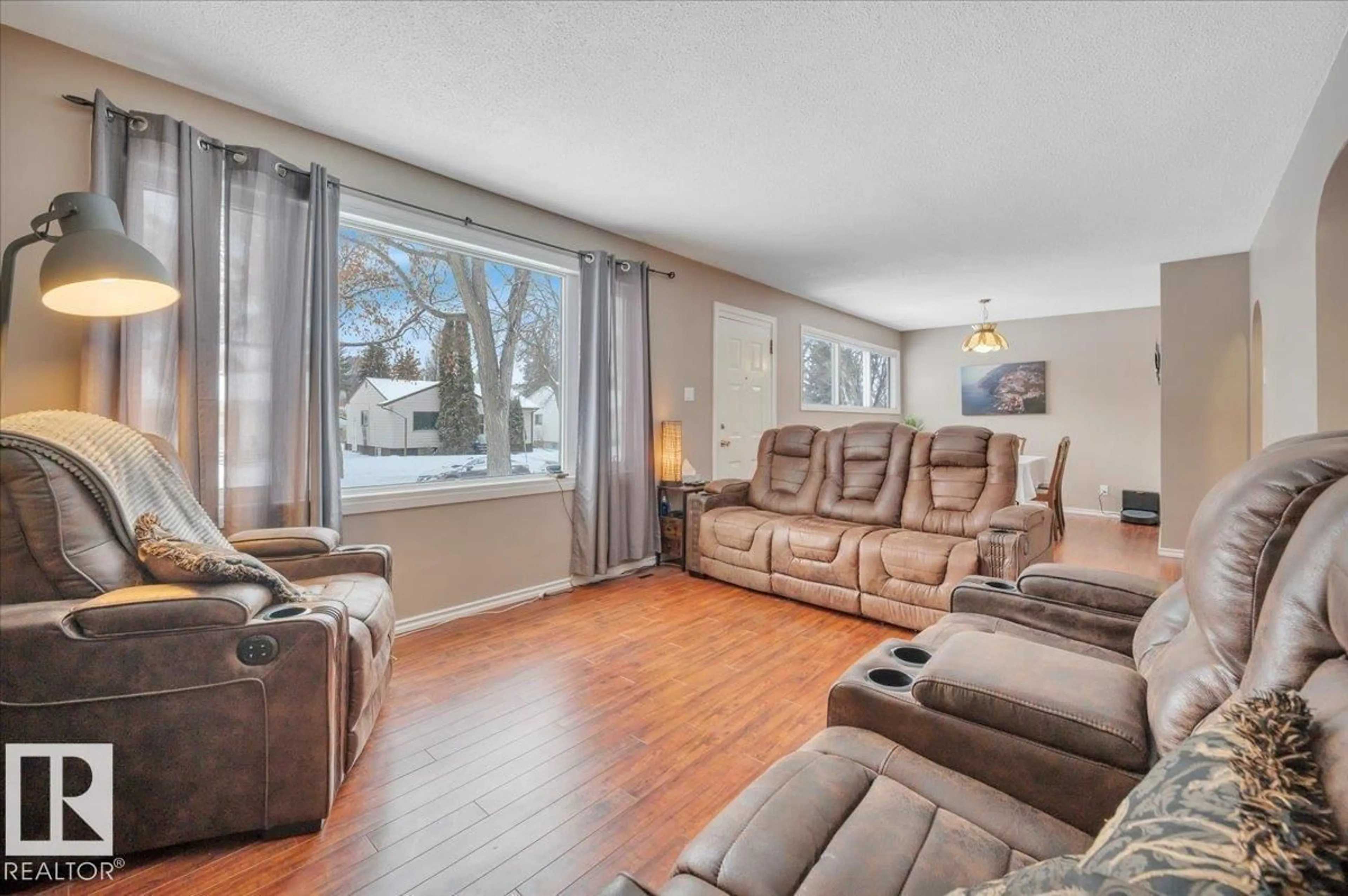 Living room with furniture, unknown for 7934 81 AV, Edmonton Alberta T6C0V7
