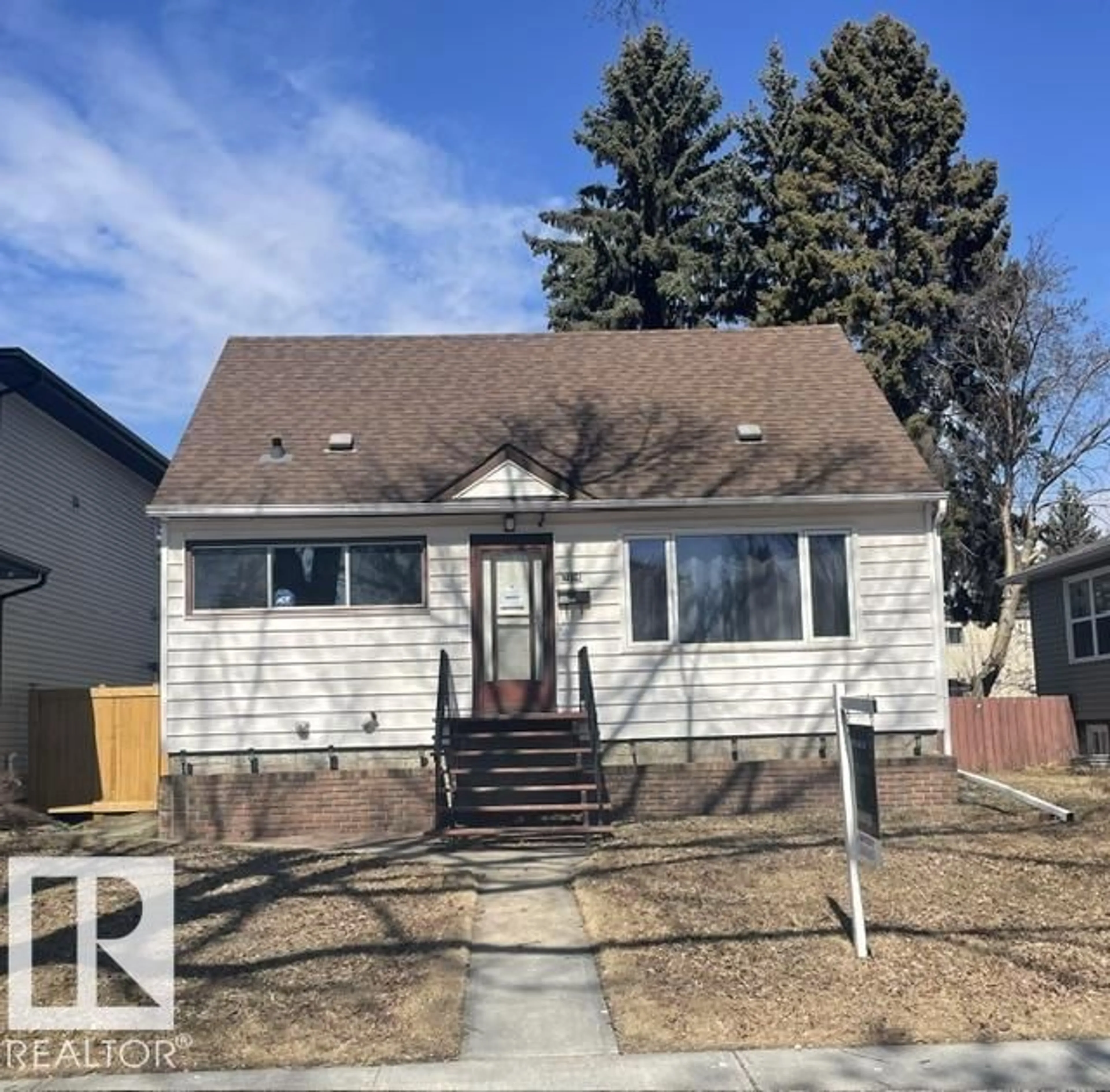 Home with vinyl exterior material, street for 7934 81 AV, Edmonton Alberta T6C0V7