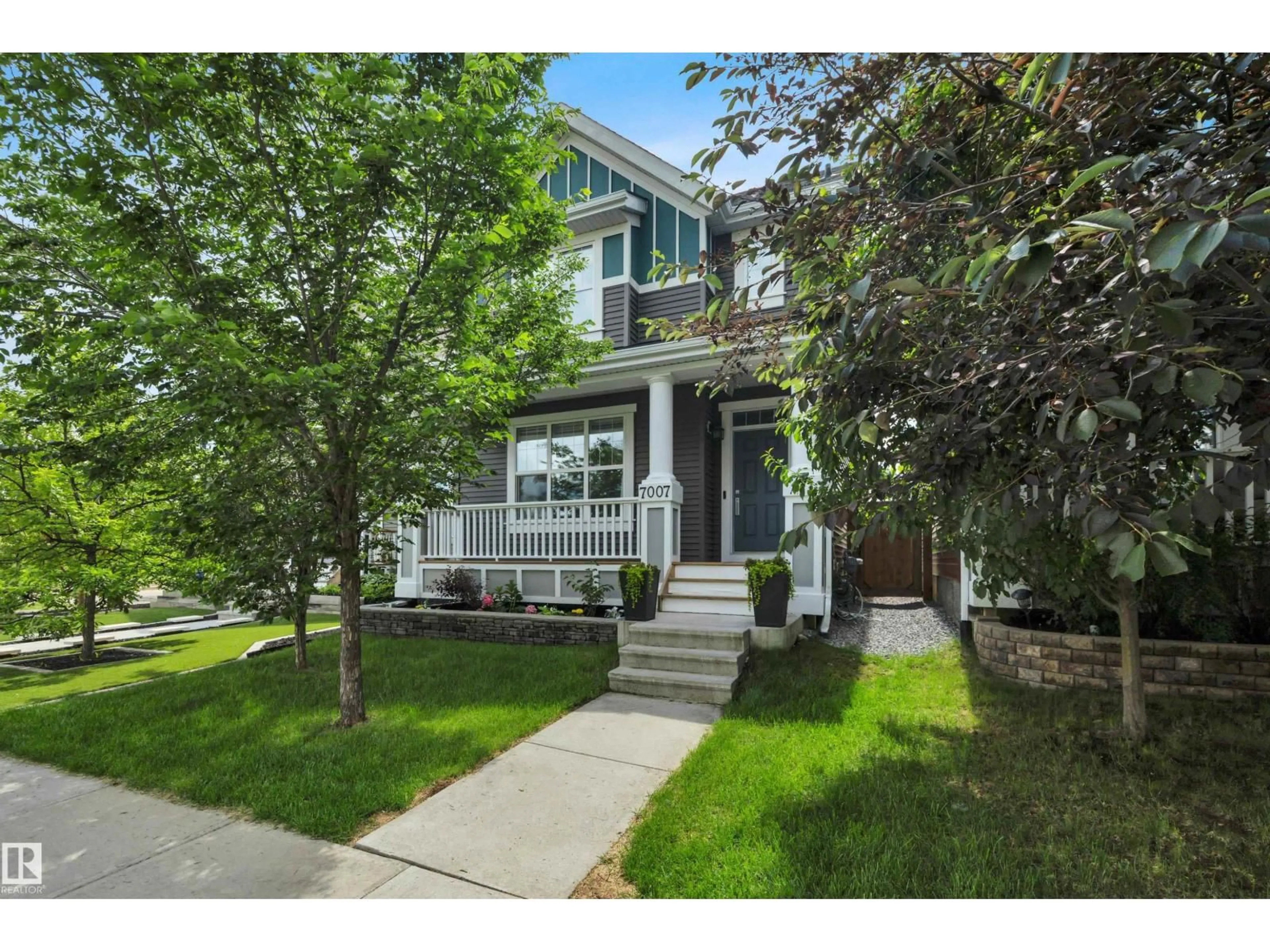 Home with vinyl exterior material, street for 7007 SUMMERSIDE GRANDE BV, Edmonton Alberta T6X2E7