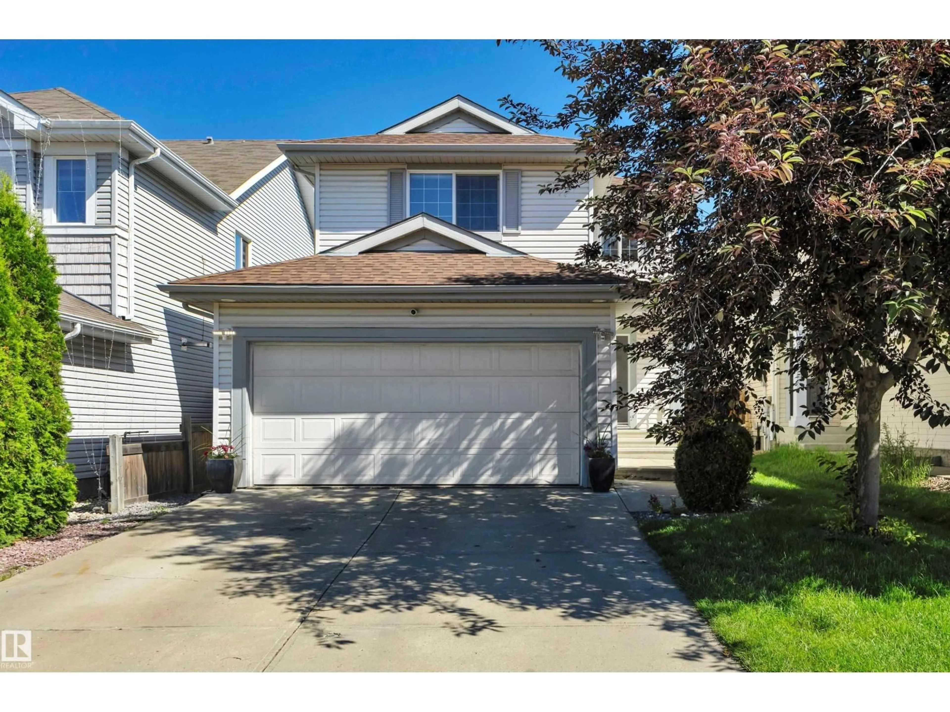 Home with vinyl exterior material, street for 5912 8 AV, Edmonton Alberta T6X0G5