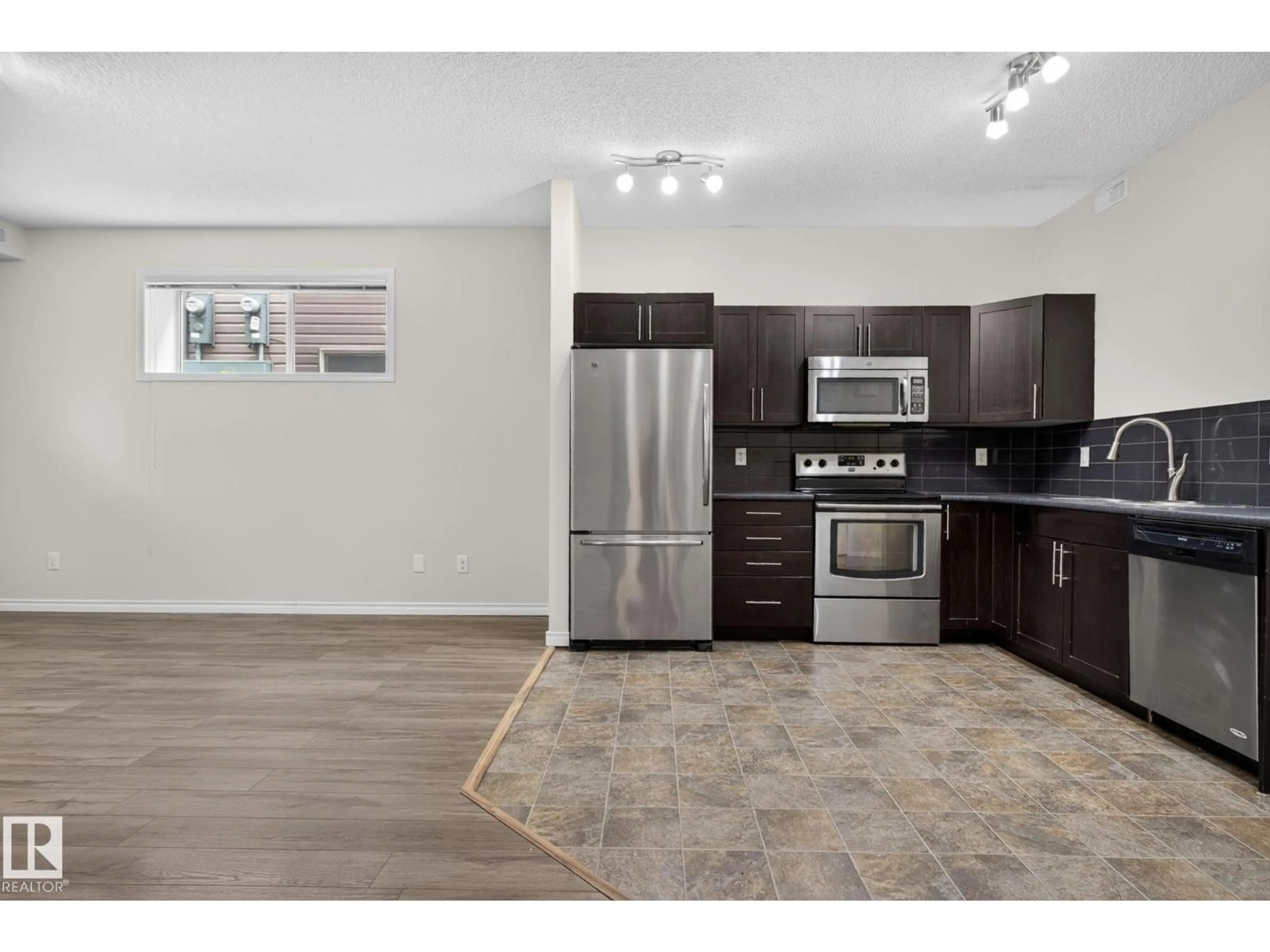 Open concept kitchen, unknown for #18 - 6520 2 AV SW, Edmonton Alberta T6X1S4