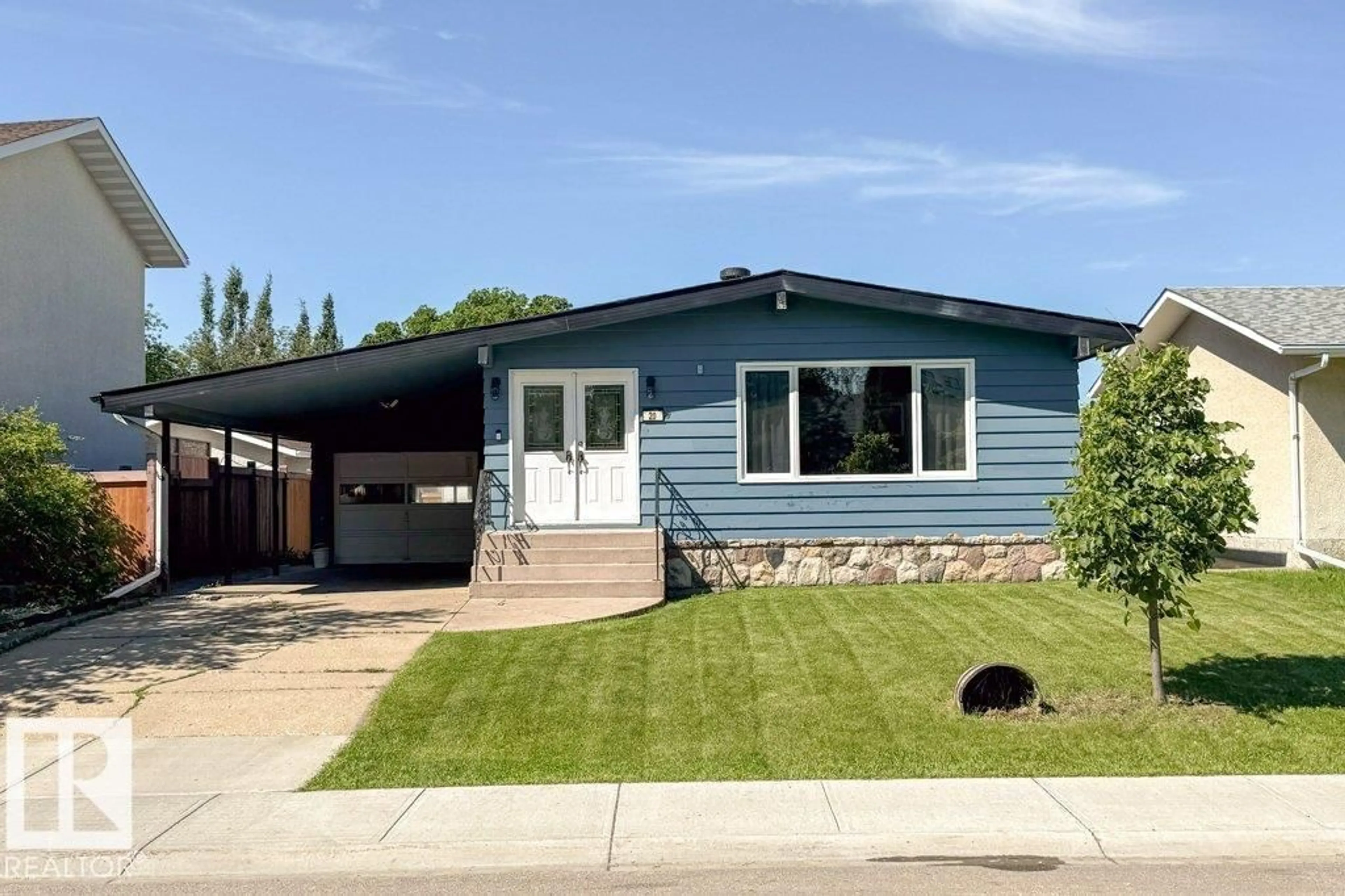 Home with vinyl exterior material, street for 20 CHIPPEWA RD, Leduc Alberta T9E4M8