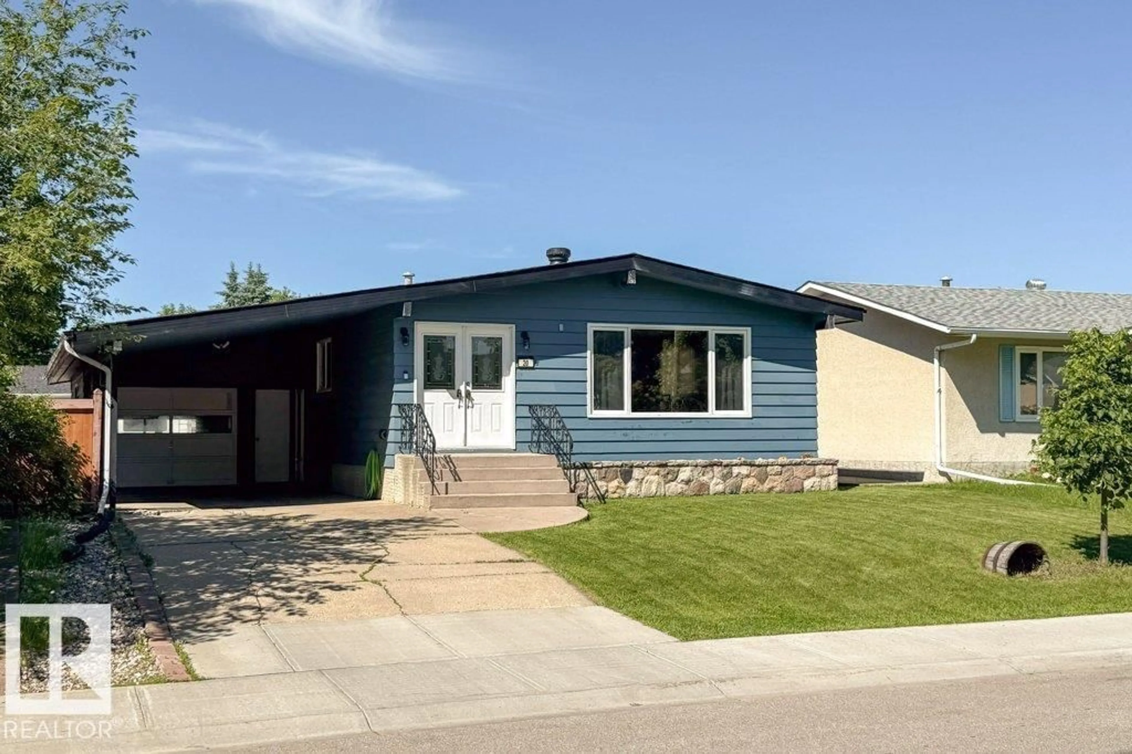 Home with vinyl exterior material, street for 20 CHIPPEWA RD, Leduc Alberta T9E4M8