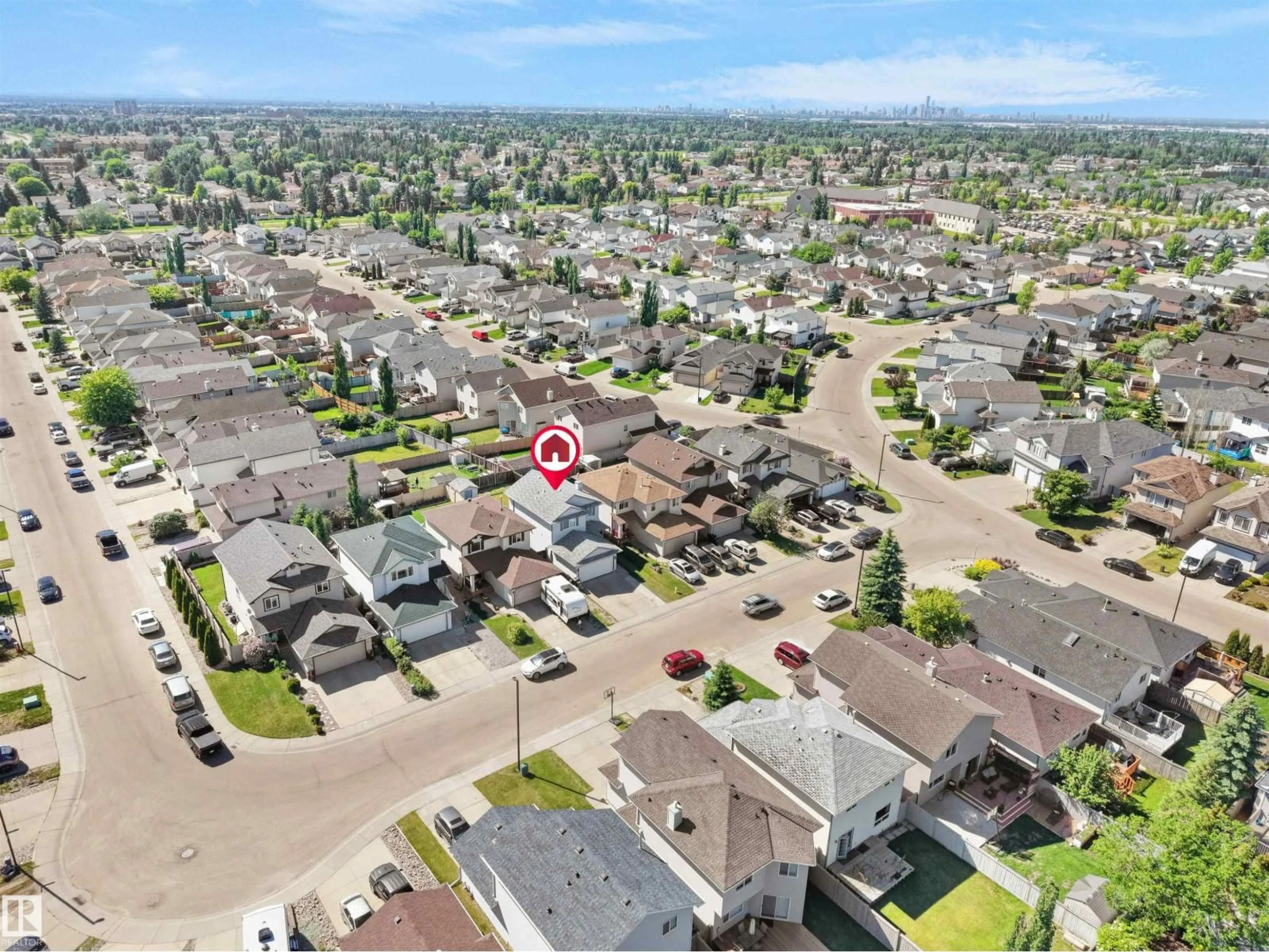 A pic from outside/outdoor area/front of a property/back of a property/a pic from drone, street for NW - 2418 32B ST, Edmonton Alberta T6T1Y6