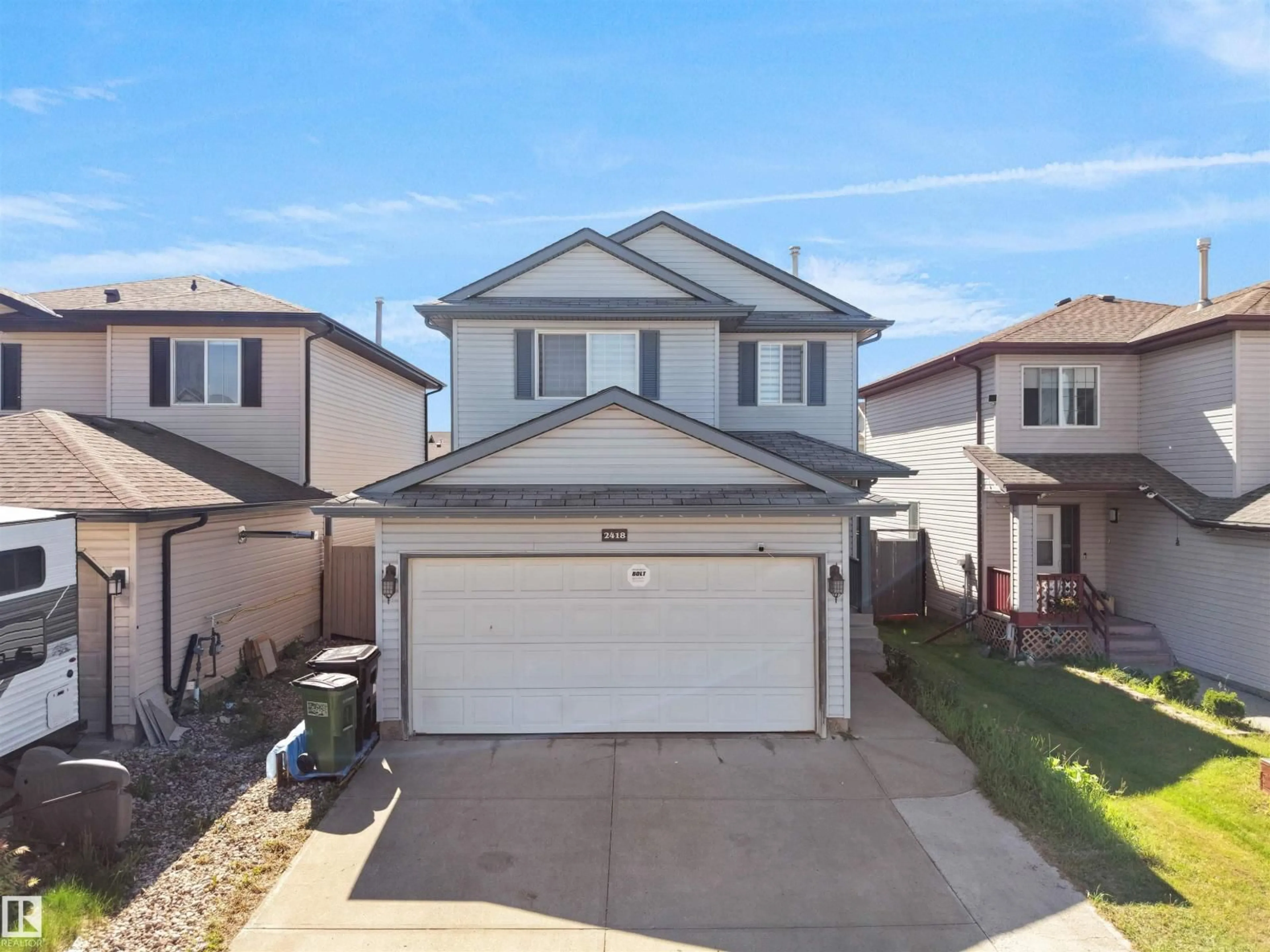 A pic from outside/outdoor area/front of a property/back of a property/a pic from drone, street for NW - 2418 32B ST, Edmonton Alberta T6T1Y6