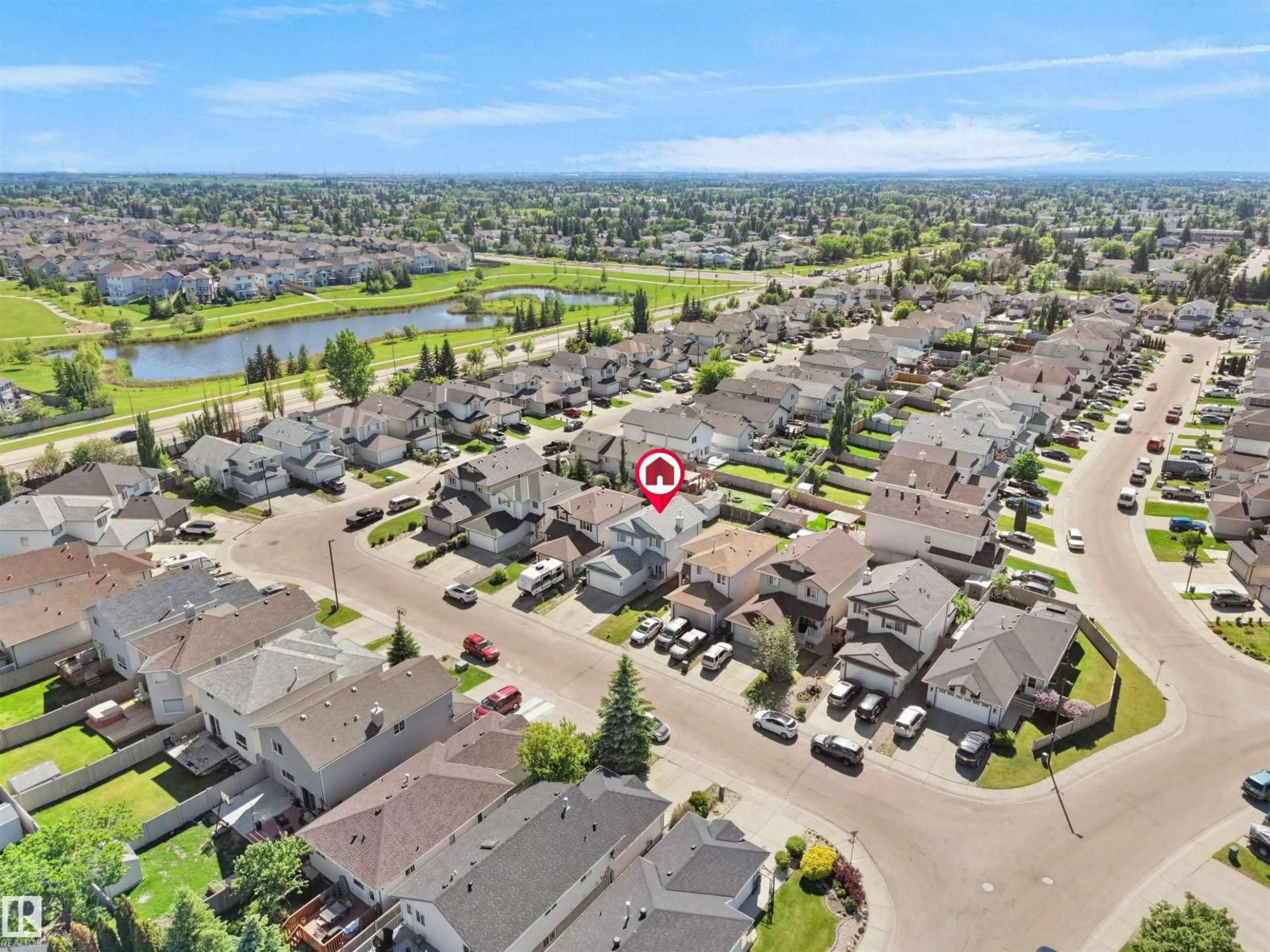 A pic from outside/outdoor area/front of a property/back of a property/a pic from drone, water/lake/river/ocean view for NW - 2418 32B ST, Edmonton Alberta T6T1Y6