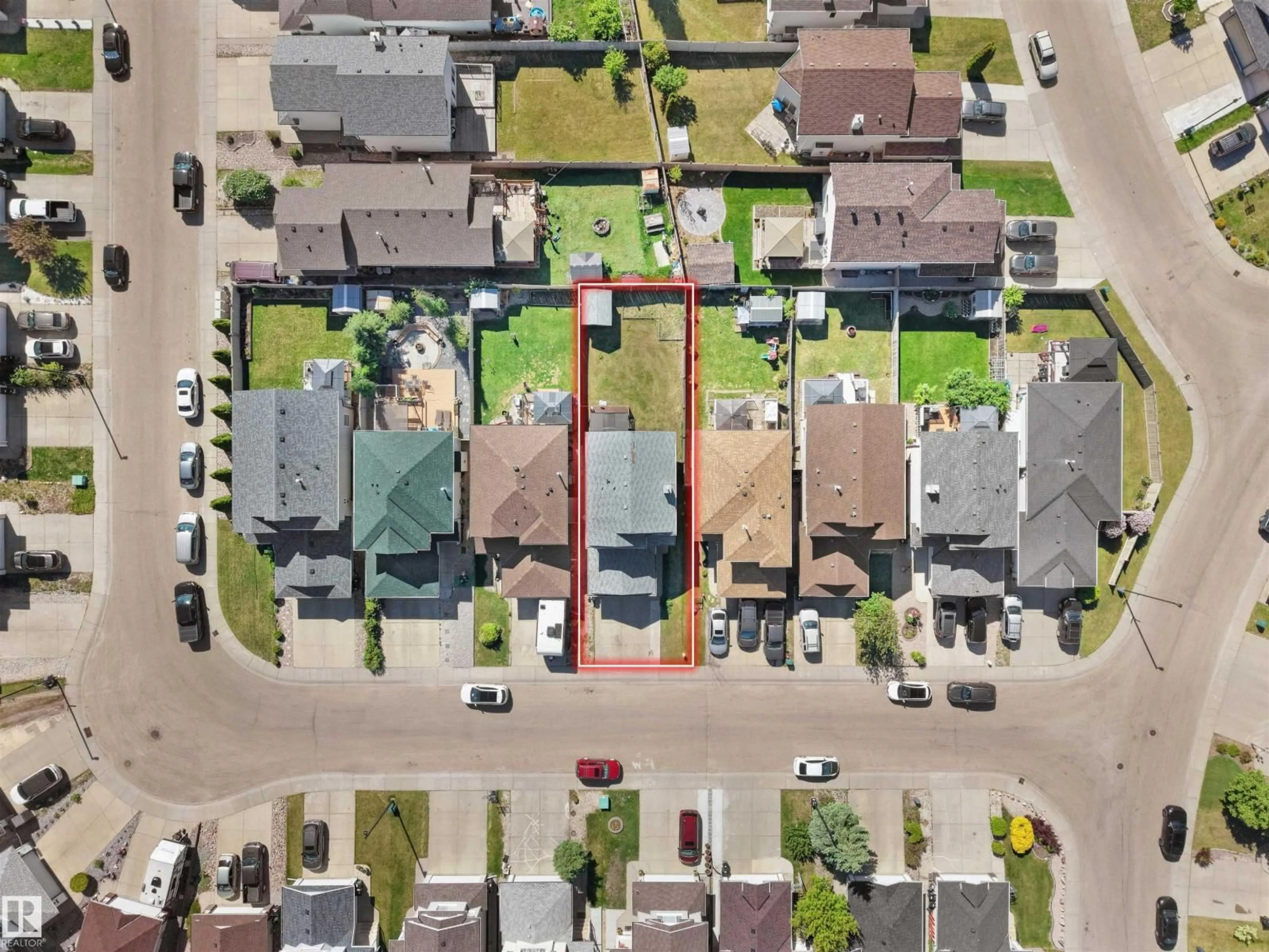 A pic from outside/outdoor area/front of a property/back of a property/a pic from drone, street for NW - 2418 32B ST, Edmonton Alberta T6T1Y6