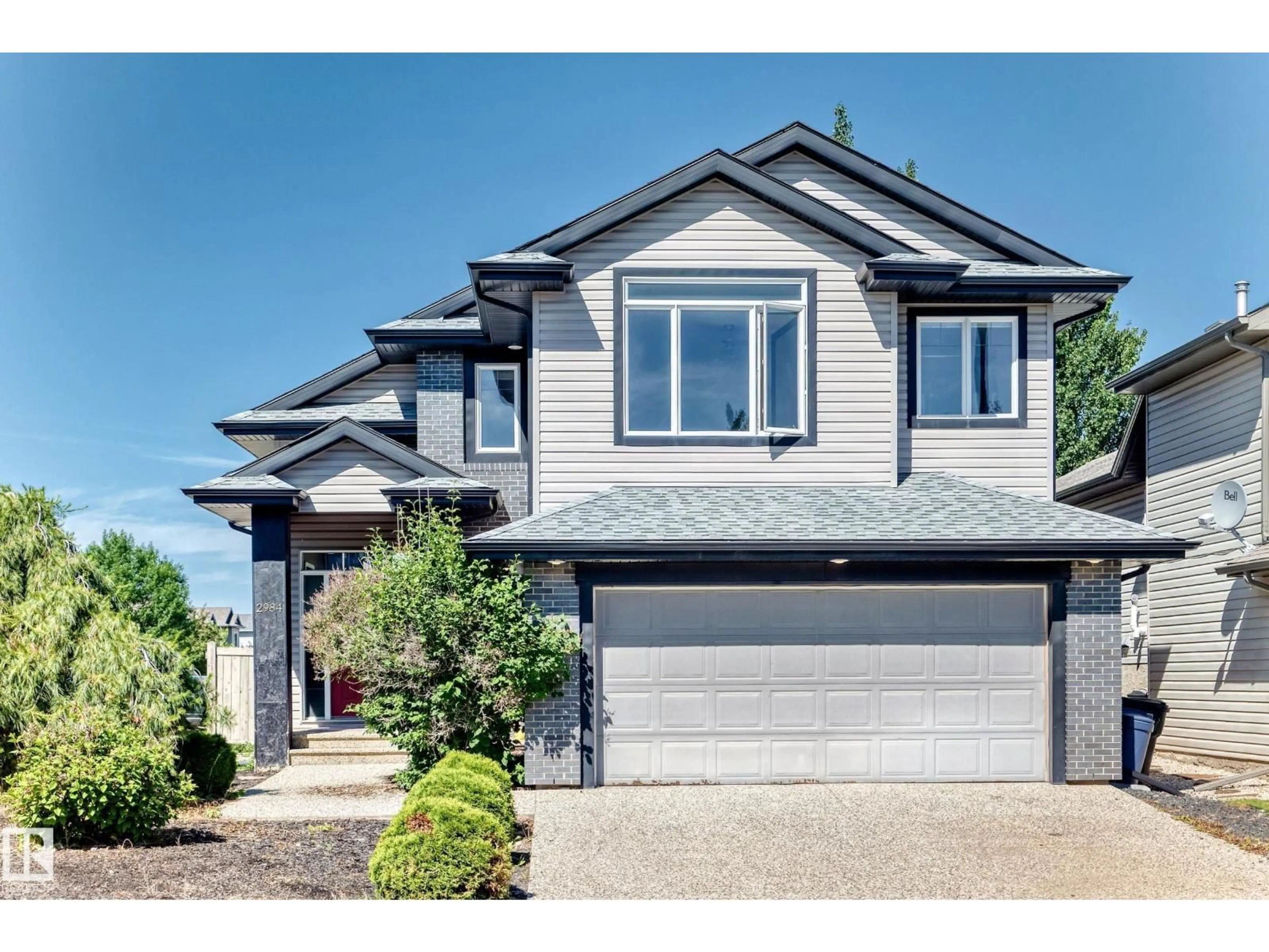 Home with vinyl exterior material, street for 2984 MCPHADDEN WY, Edmonton Alberta T6W1P8
