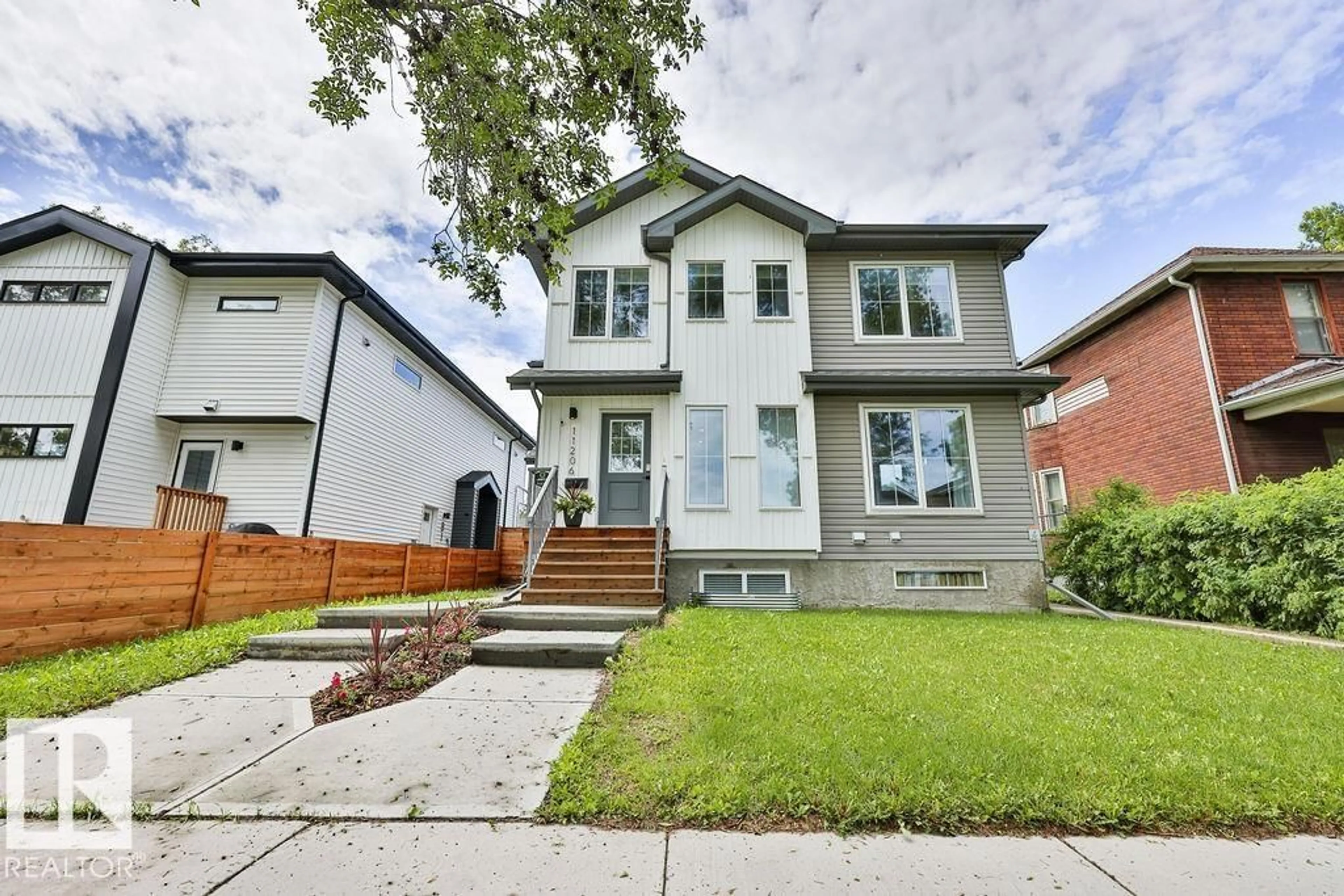 Home with brick exterior material, street for NW - 11206 95A ST, Edmonton Alberta T5G1N8