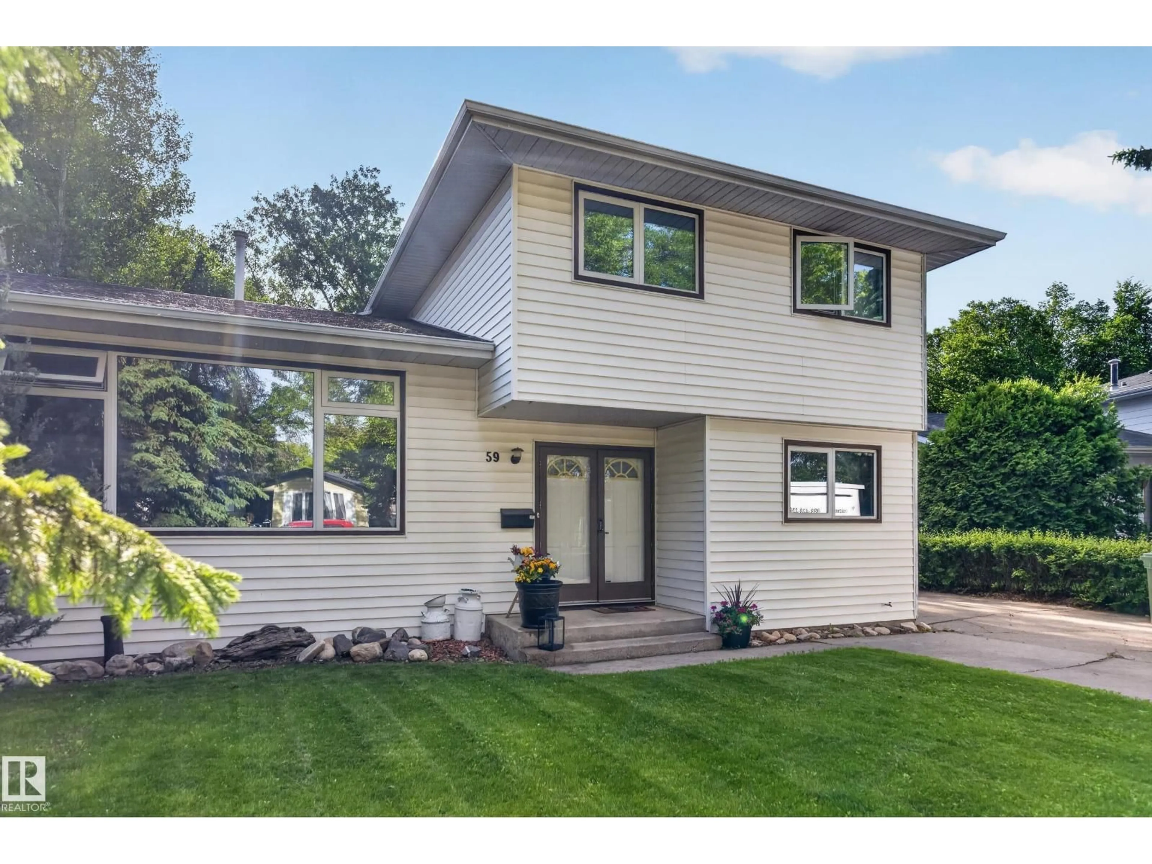 Home with vinyl exterior material, street for 59 FAIR OAKS DR, St. Albert Alberta T8N1P9