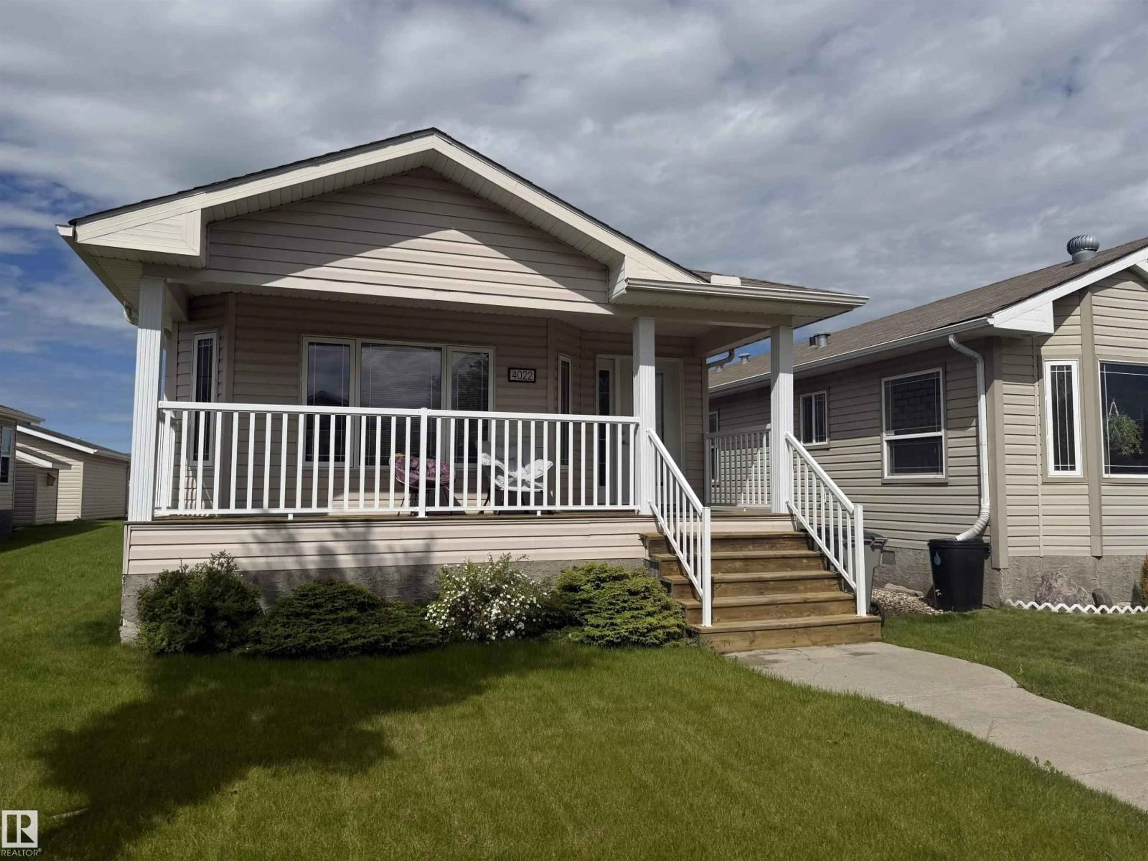 Home with vinyl exterior material, street for 4022 ASPEN WY, Leduc Alberta T9E8P9