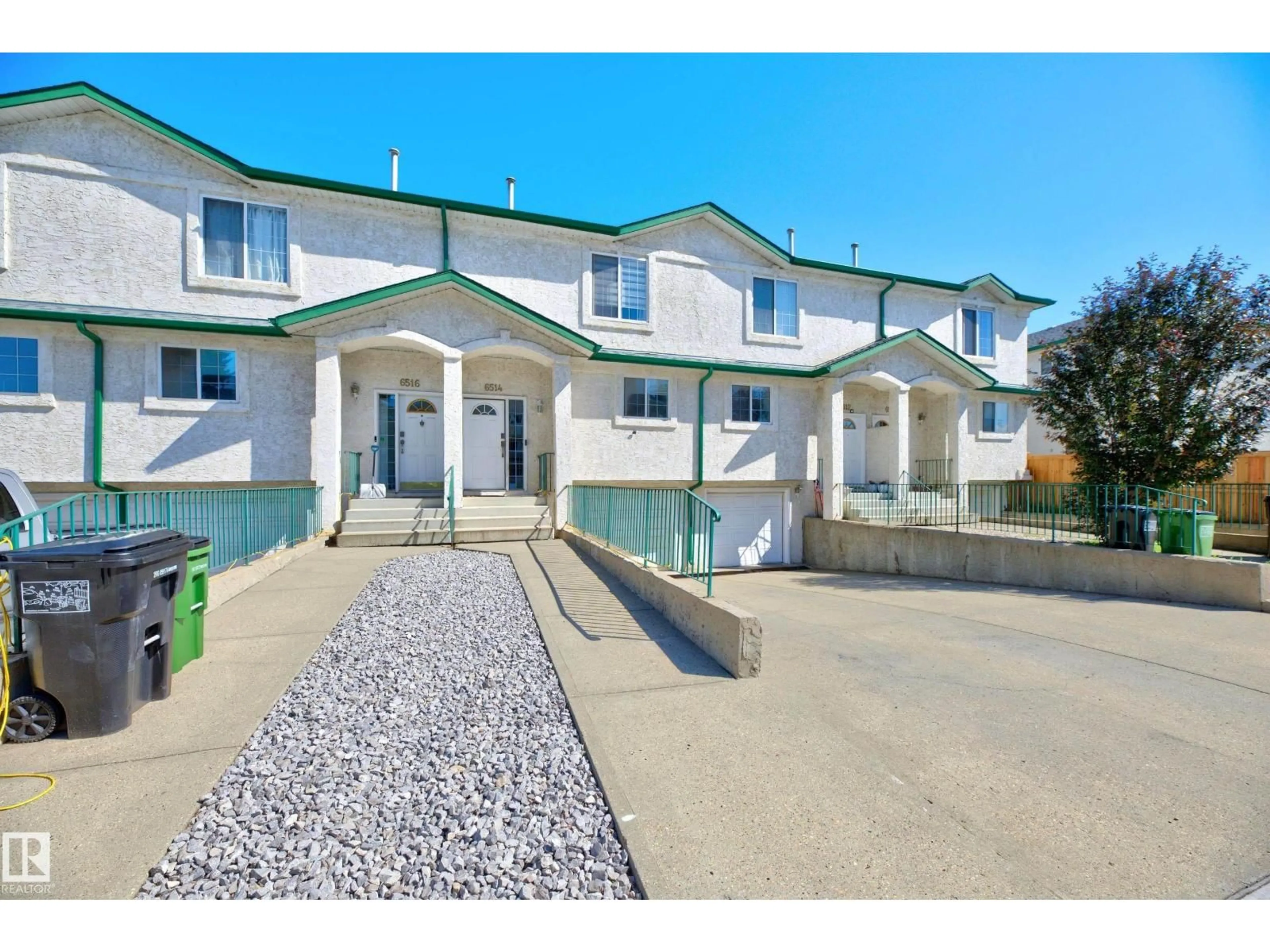A pic from outside/outdoor area/front of a property/back of a property/a pic from drone, street for 6514 19 AV, Edmonton Alberta T6L7A2