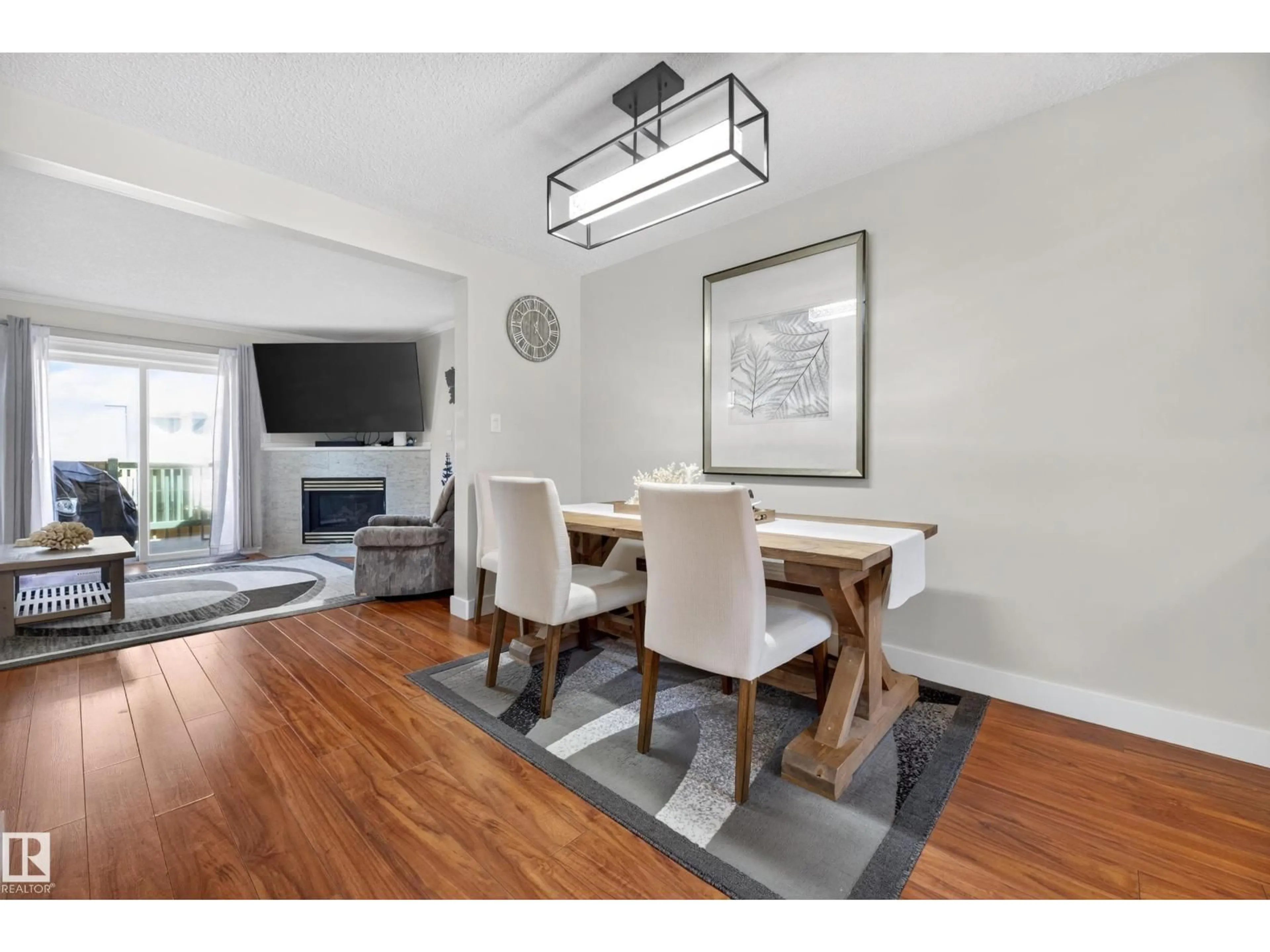 Dining room, wood/laminate floor for 6514 19 AV, Edmonton Alberta T6L7A2