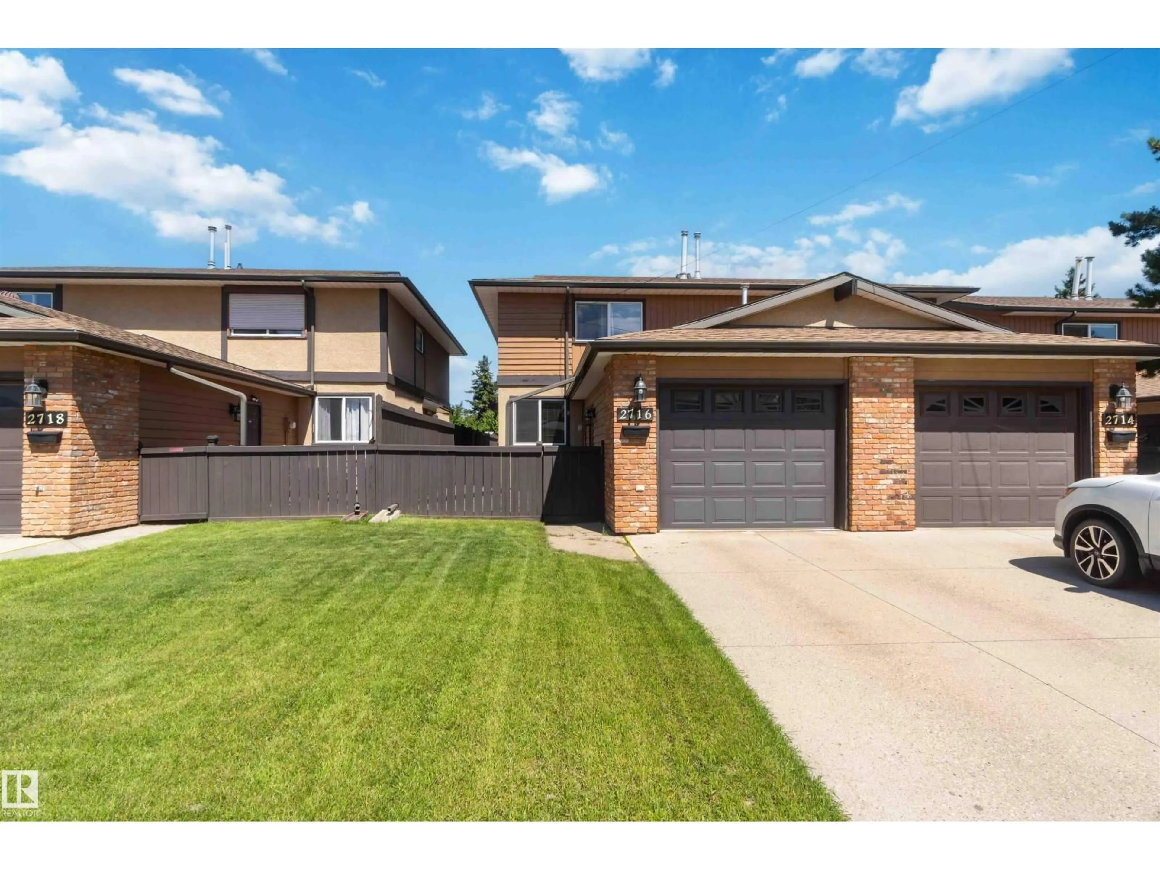 Home with brick exterior material, street for 2716 136A AV, Edmonton Alberta T5A4B6