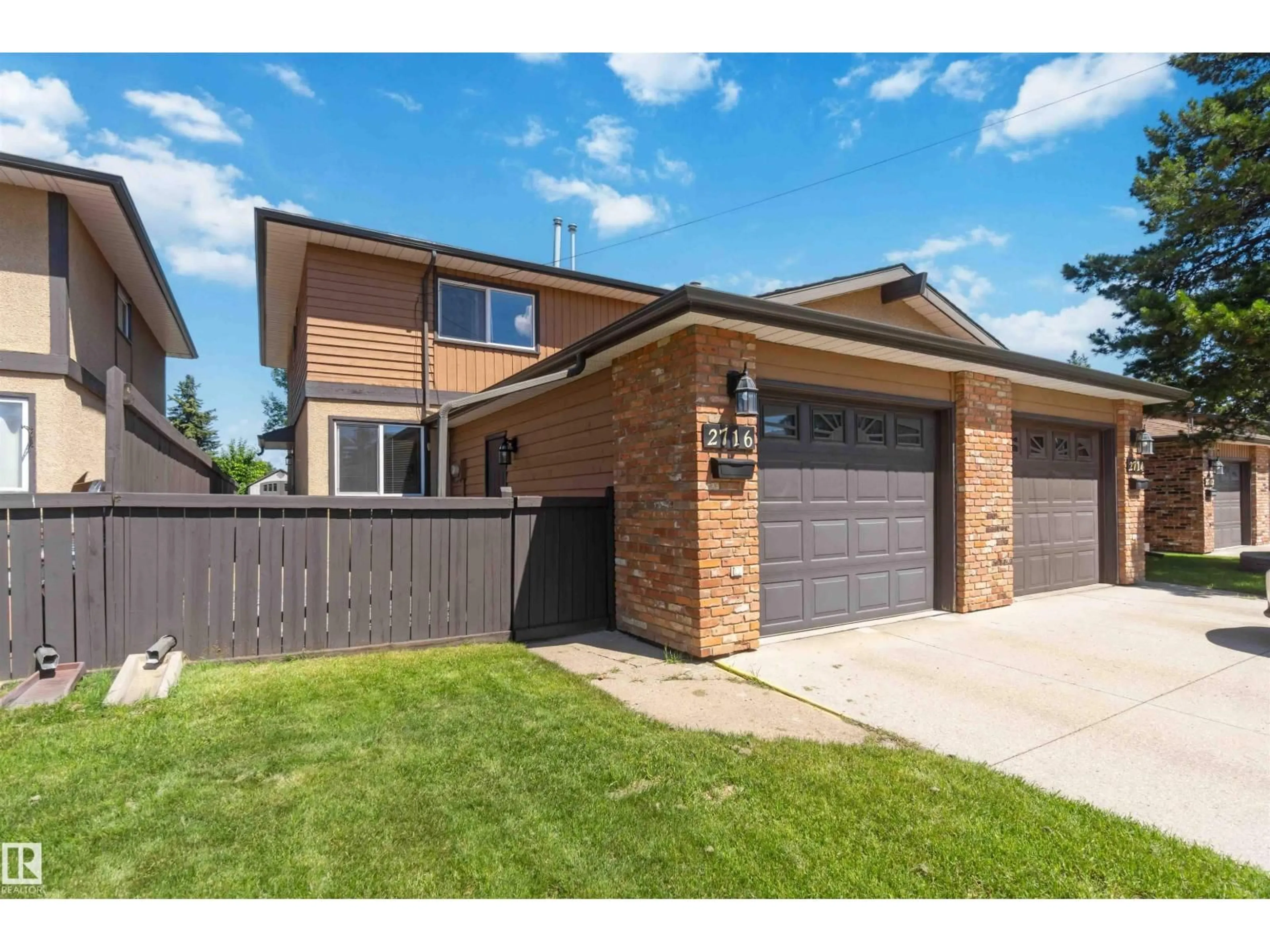 Home with brick exterior material, street for 2716 136A AV, Edmonton Alberta T5A4B6